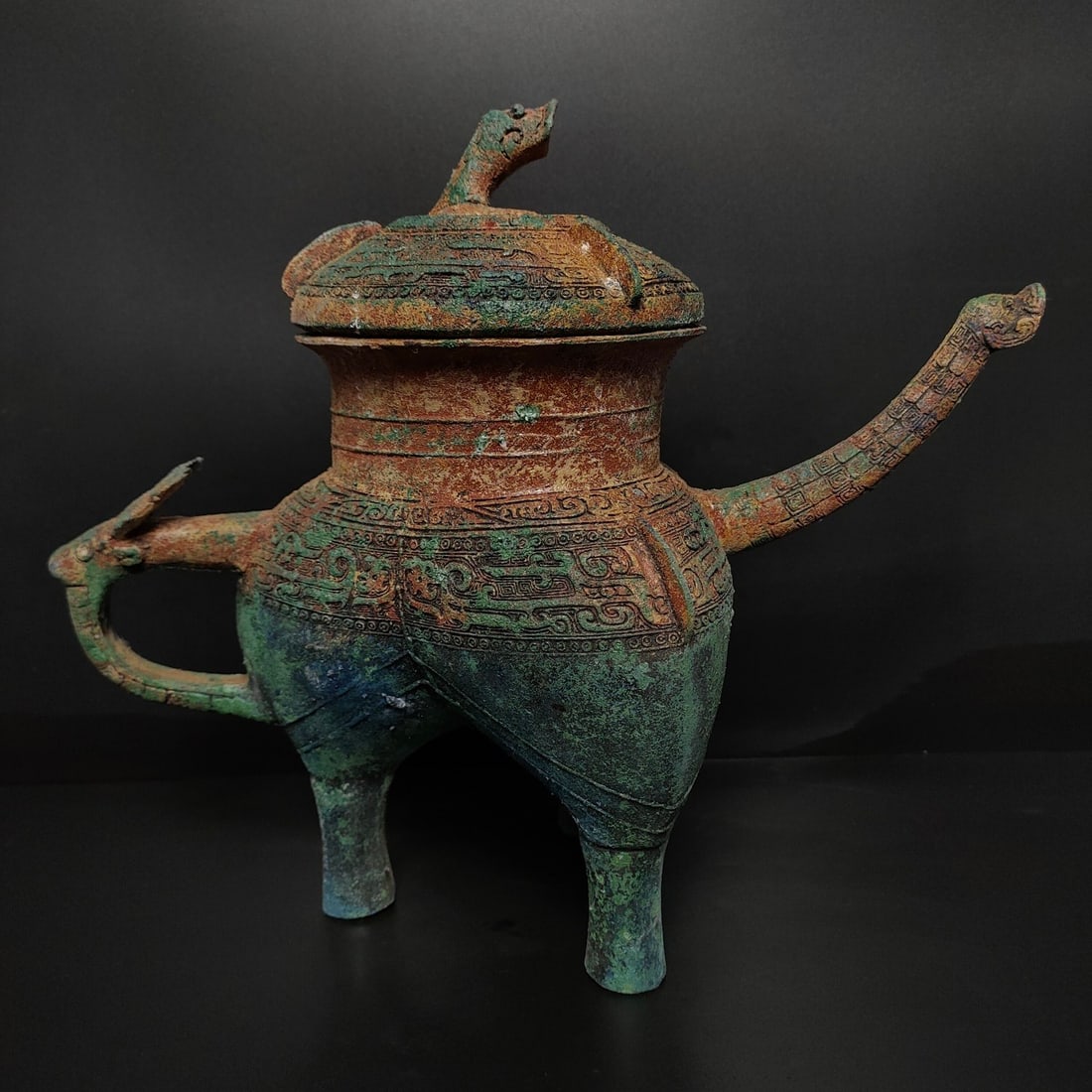 A bronze long-billed rice pot from the Shang and Zhou dynasties: Bronze long-billed rice pot from the Shang and Zhou dynasties Size:H:29cm W:34cm W:3.3kg (The Dimensions Of All Batches Are Manually Measured.If You Need More Detailed Information, Please Contact Our