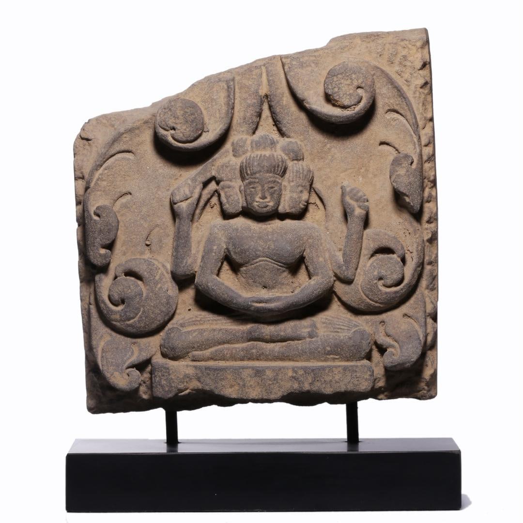 A beautiful seated statue of the three-faced Buddha carved in stone from Nanchuan (1 of 9)