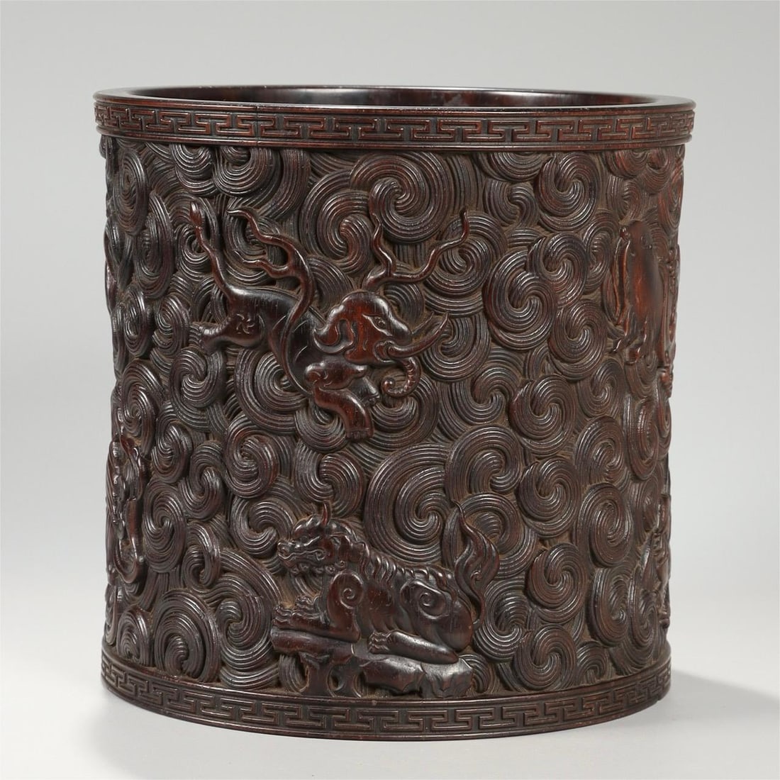 A Qing Dynasty sour branch wood carved sea beast pattern waist pen holder: Qing Dynasty sour branch wood carving sea beast pattern waist pen holder Size:H:20cm Calibre:20.5cm W:1362.5g (The Dimensions Of All Batches Are Manually Measured.If You Need More Detailed Information