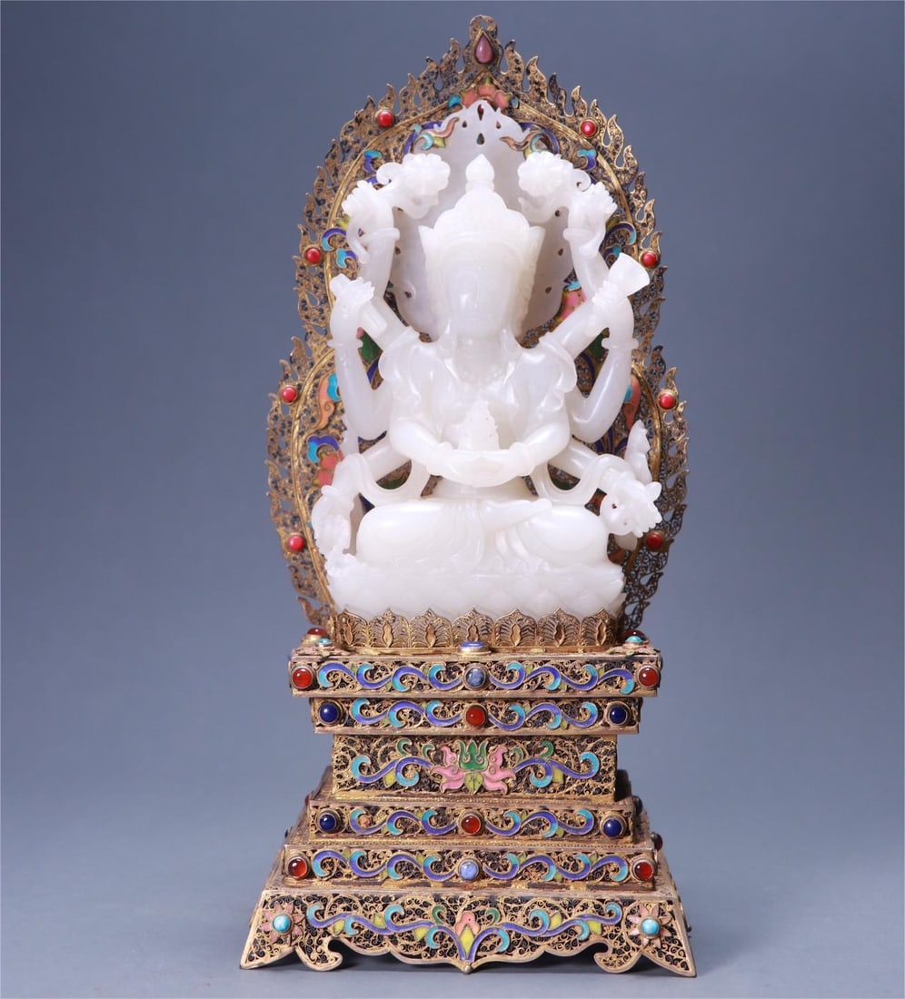 A beautiful Hetian jade-inlaid silver-gilt blue eight-armed Guanyin seated statue: Exquisite Hetian jade-inlaid silver-gilt blue eight-armed Guanyin seated statue Size:L:11.5cm W:8cm H:25.5cm W:918g (The Dimensions Of All Batches Are Manually Measured.If You Need More Detailed Infor