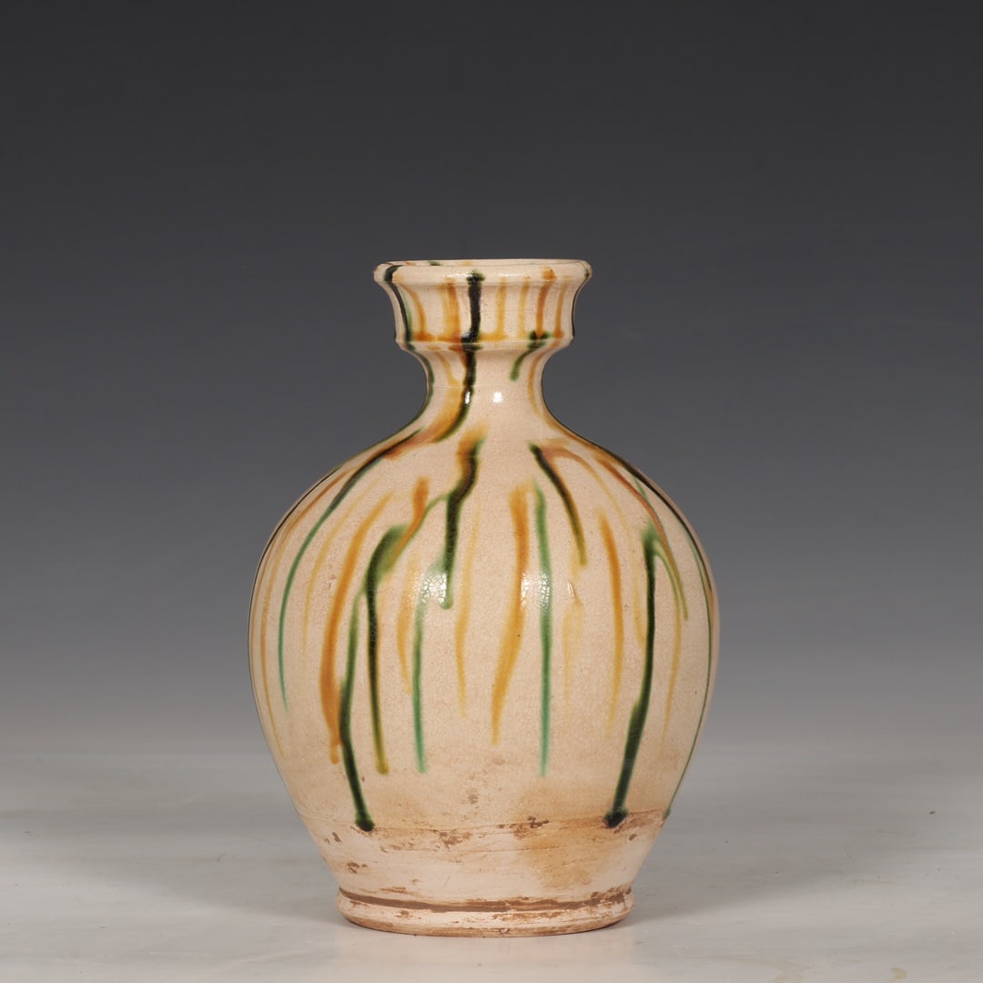 A three-color plate bottle from the Gongxian kiln in the Tang Dynasty (1 of 9)