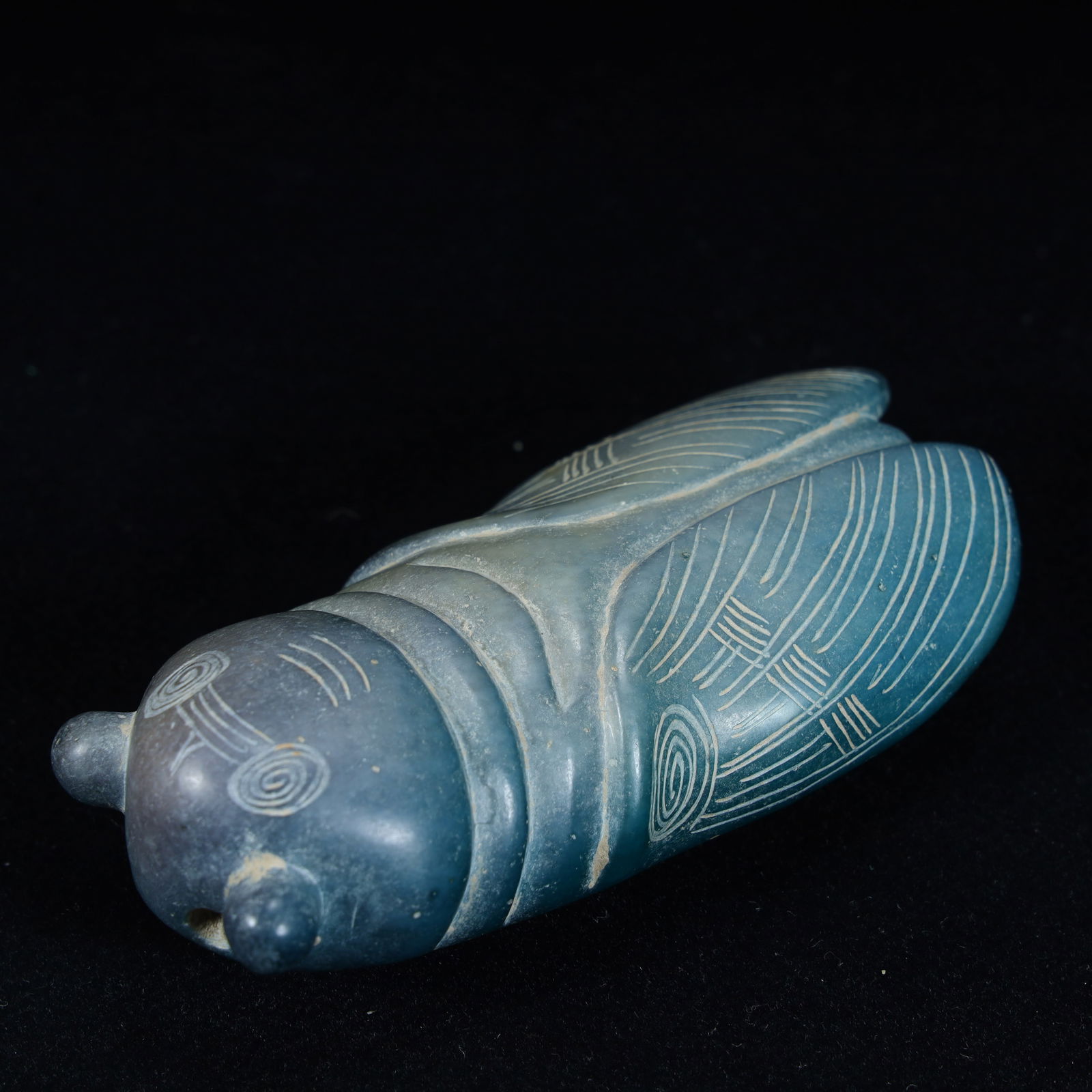A jade cicada handle piece of the Han Dynasty (1 of 10)