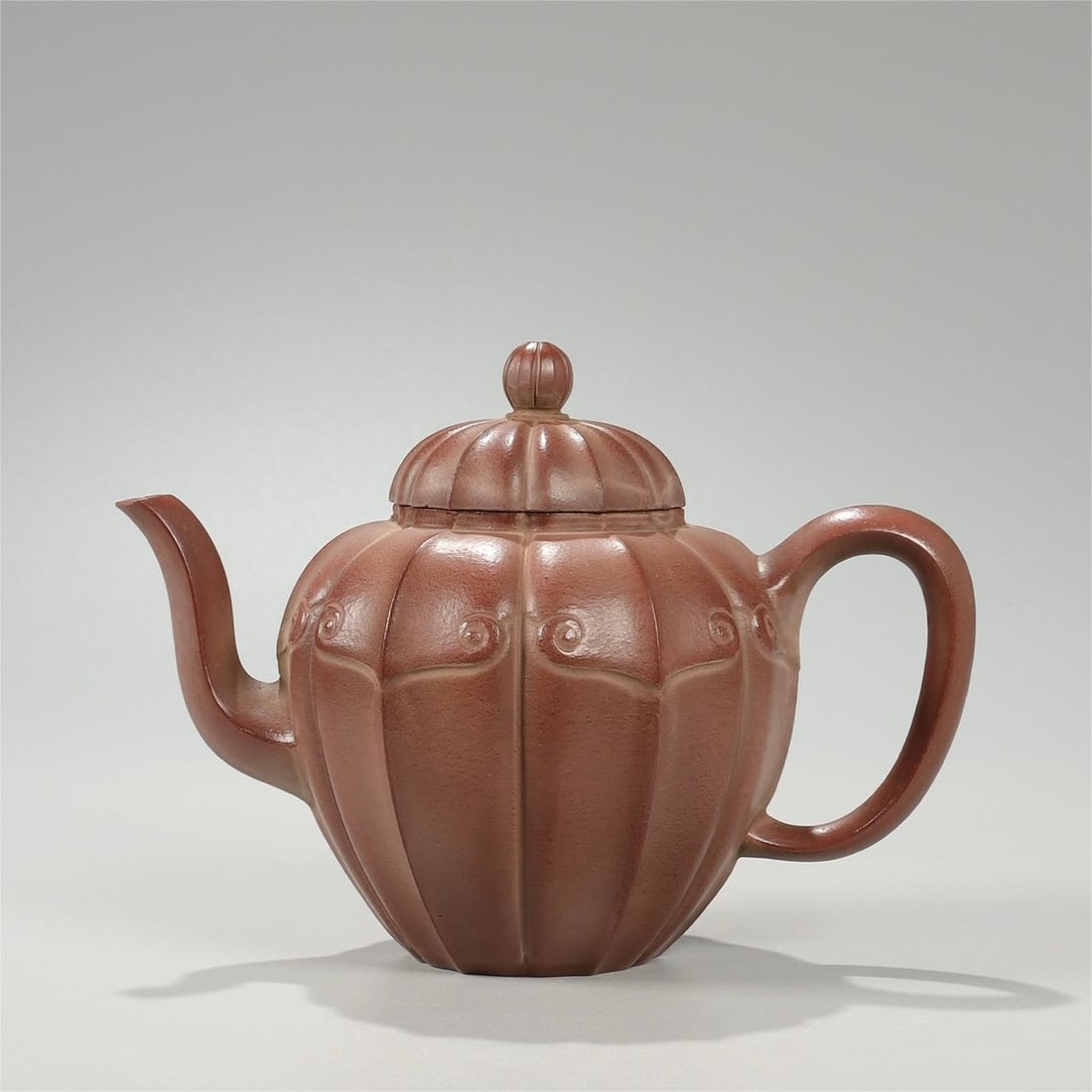 A Qing Dynasty purple sand Shao Liang made a ruyi melon and water chestnut pot (1 of 9)