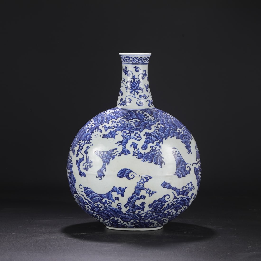 A large flat bottle with a blue and white blank engraved seawater cloud dragon pattern made in the (1 of 9)