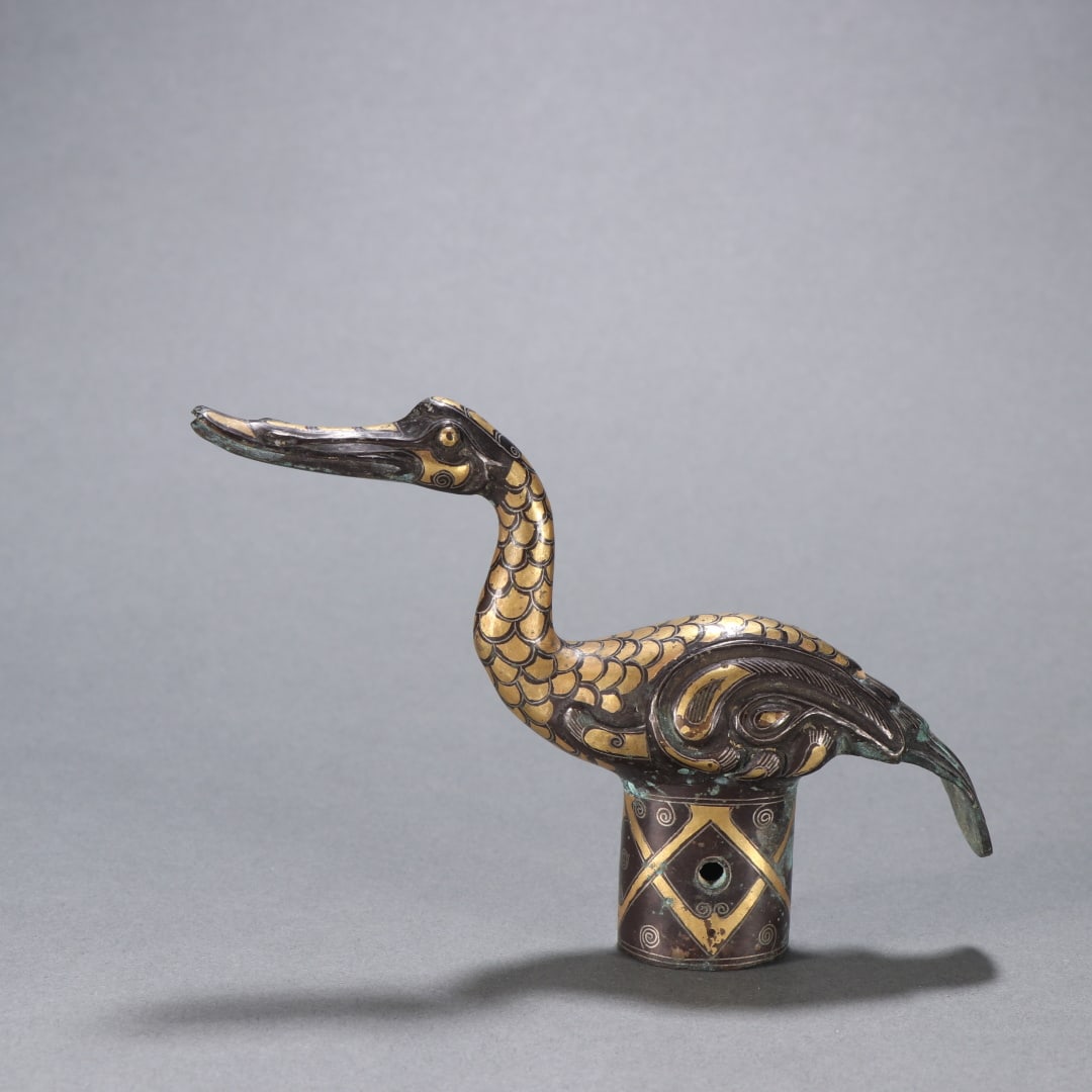 A bronze gold and silver bird-shaped staff head of the Han Dynasty (1 of 9)