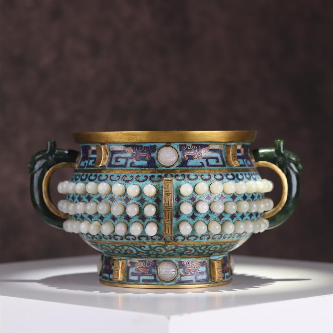 A cloisonn é inlaid with Hetian jade double dragon ear furnace made in the Qianlong period of the: Qing Dynasty Qianlong year cloisonné inlaid Hetian jade double dragon ear furnace Size:24.2x19x13.2cm W:1905g (The Dimensions Of All Batches Are Manually Measured.If You Need More Detailed Informatio