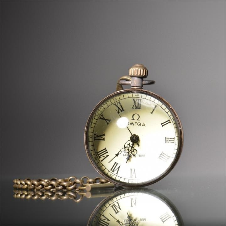 A fine twentieth-century crystal spherical mechanical clock (1 of 9)