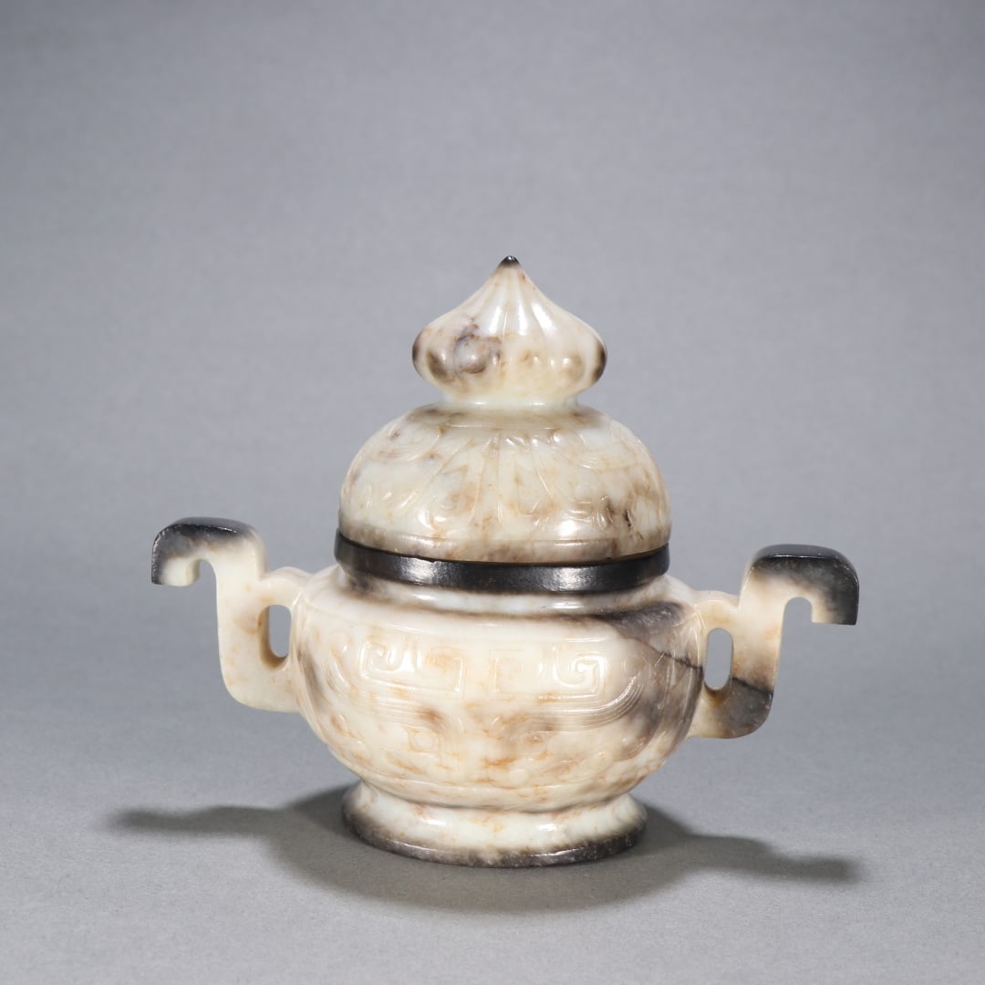 A Ming Dynasty Hetian jade oil extraction gluttonous pattern incense burner: The Ming Dynasty's Hetian jade oil gluttonous incense burner Size:H:10.5cm W:12.3cm W:319.5g (The Dimensions Of All Batches Are Manually Measured.If You Need More Detailed Information, Please Contact