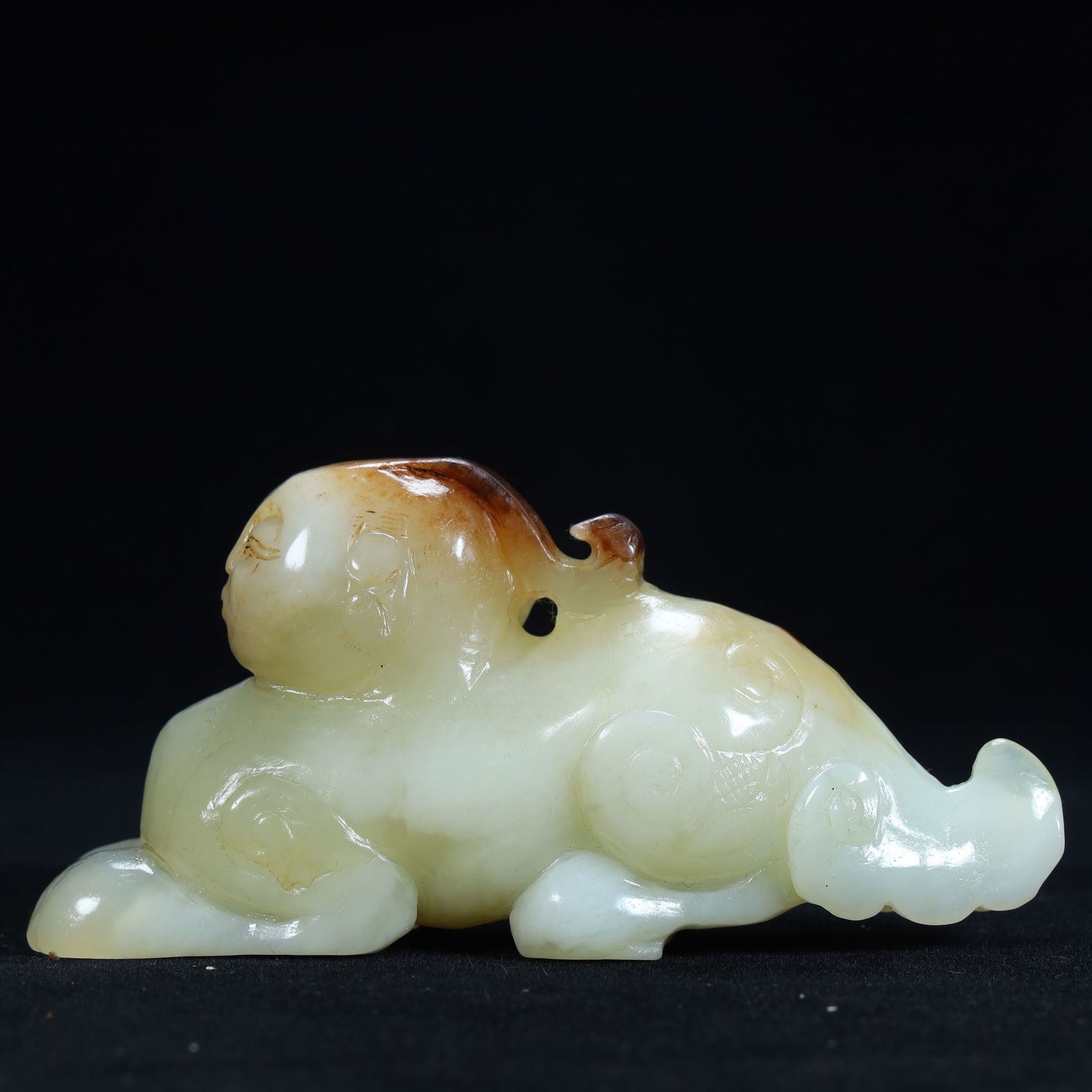 A Qing Dynasty Hetian jade beast ornament (1 of 11)