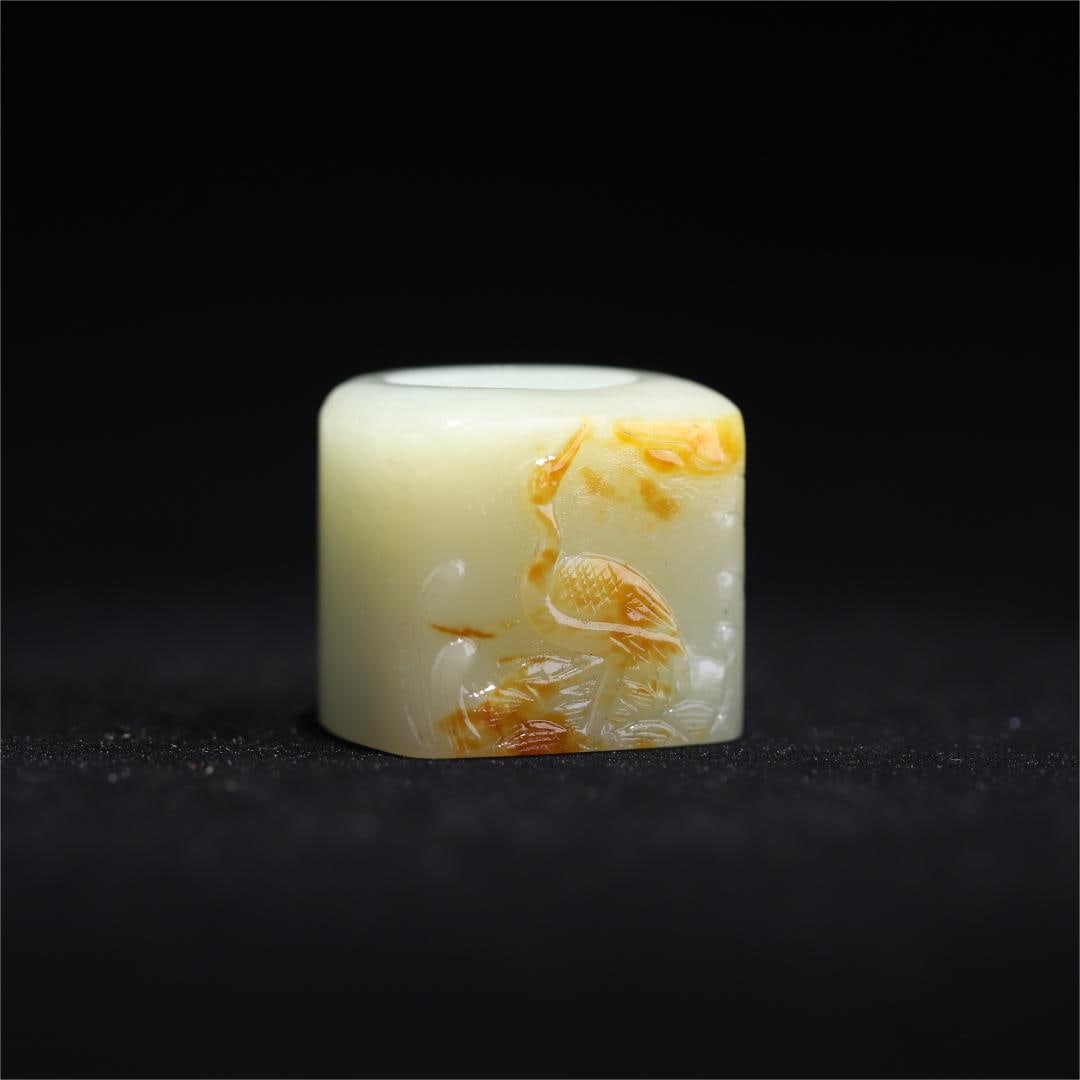 A crane pattern finger of Hetian jade seed material from the Qing Dynasty (1 of 9)