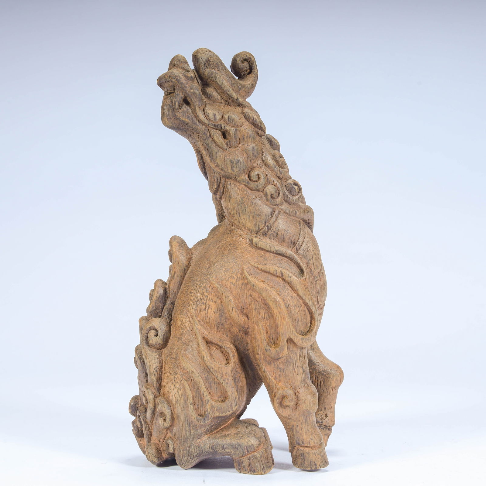 A Qing Dynasty agarwood carved auspicious beast ornament (1 of 10)