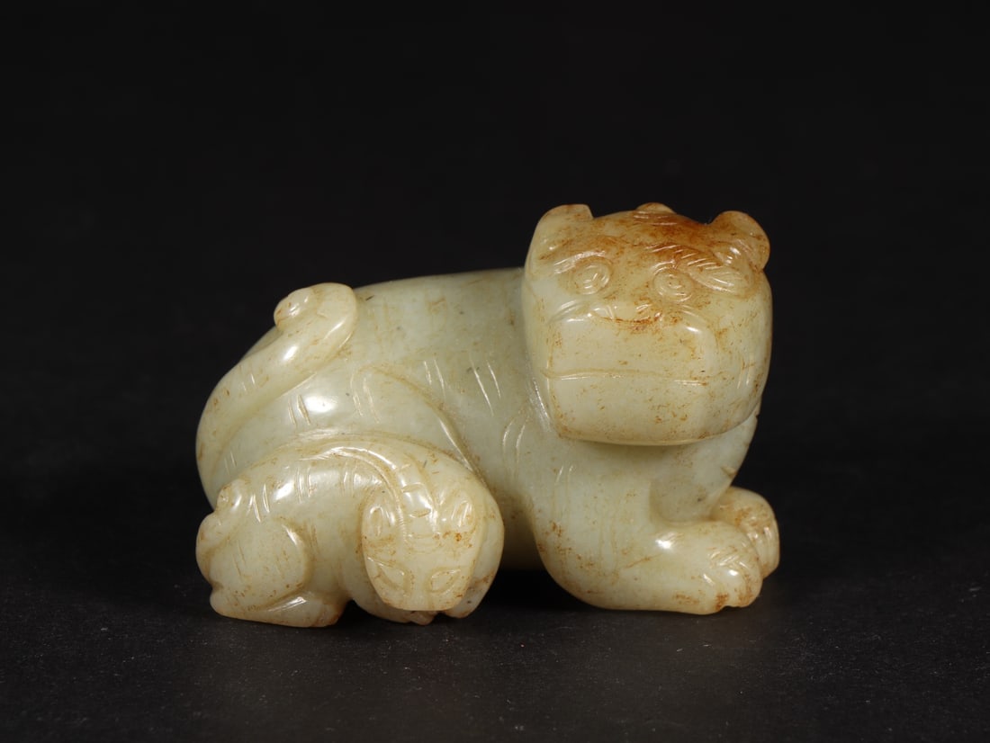 An Exquisite White Jade Auspicious Beast Ornament (1 of 9)