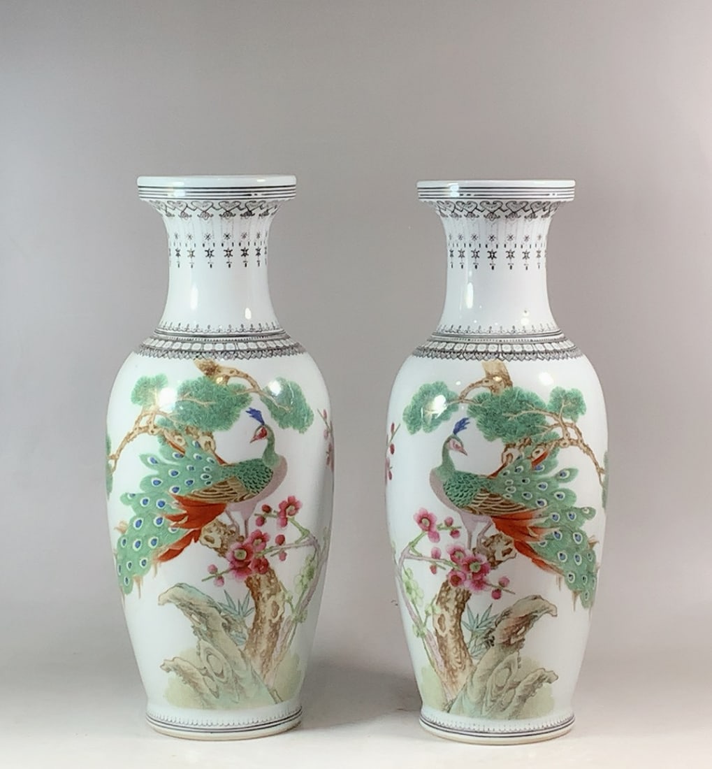 A Pair of Exquisite Famille-Rose Pine, Bamboo and Plum Blossom Pattern Flower and Bird Pattern with: A Pair of Exquisite Famille-Rose Pine, Bamboo and Plum Blossom Pattern Flower and Bird Pattern with poem Vase Qing Dynasty, China Qianlong Four-character Mark Size:30.6cmx8.8cm (The Dimensions Of All