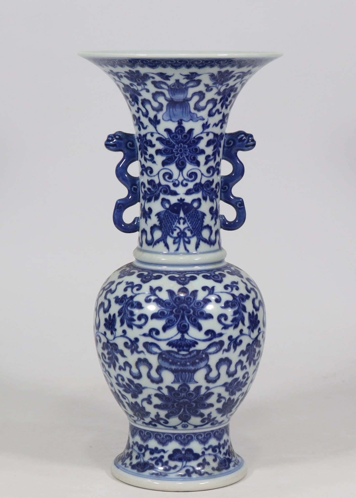 An Exquisite Blue and White Lotus Pattern Eight Treasures Pattern Double-Ears Vase: An Exquisite Blue and White Lotus Pattern Eight Treasures Pattern Double-Ears Vase Qing Dynasty, China Qianlong Six-character Mark Size:36cmx17cm (The Dimensions Of All Batches Are Manually Measured.I