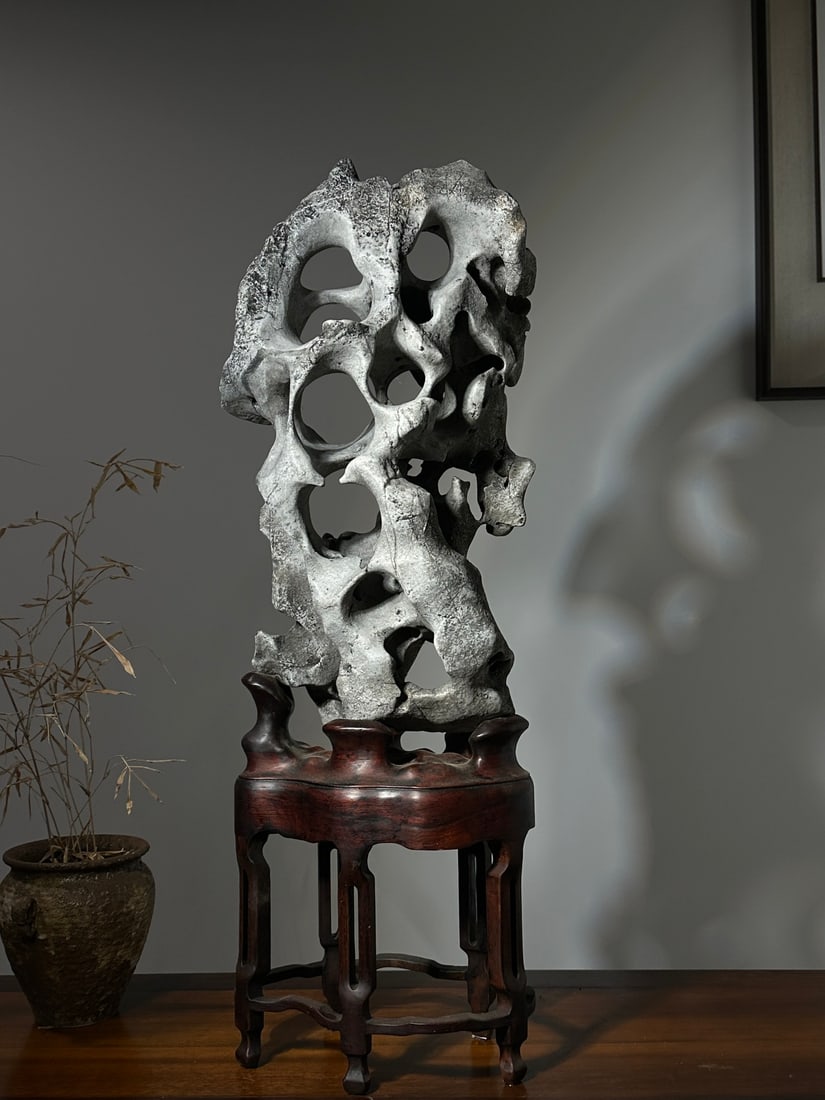 An Exquisite Taihu Stone Ornament: An Exquisite Taihu Stone Ornament Qing Dynasty, China Size:83cmx30cmx22cm (The Dimensions Of All Batches Are Manually Measured.If You Need More Detailed Information, Please Contact Our Customer Servic