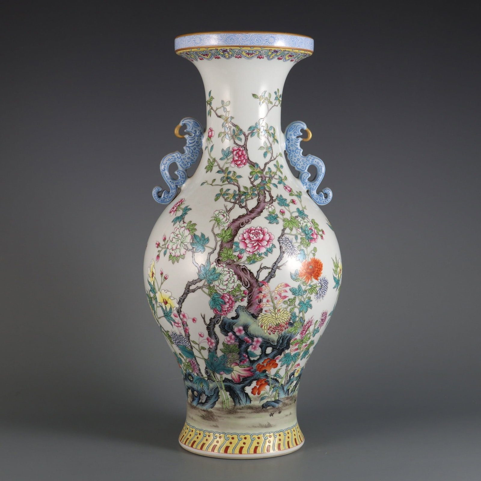 An Exquisite Famille-Rose Flower Pattern with poem Double-Ears Vase: An Exquisite Famille-Rose Flower Pattern with poem Double-Ears Vase Qing Dynasty, China Qianlong Six-character Mark Size:43cmx21cm (The Dimensions Of All Batches Are Manually Measured.If You Need More