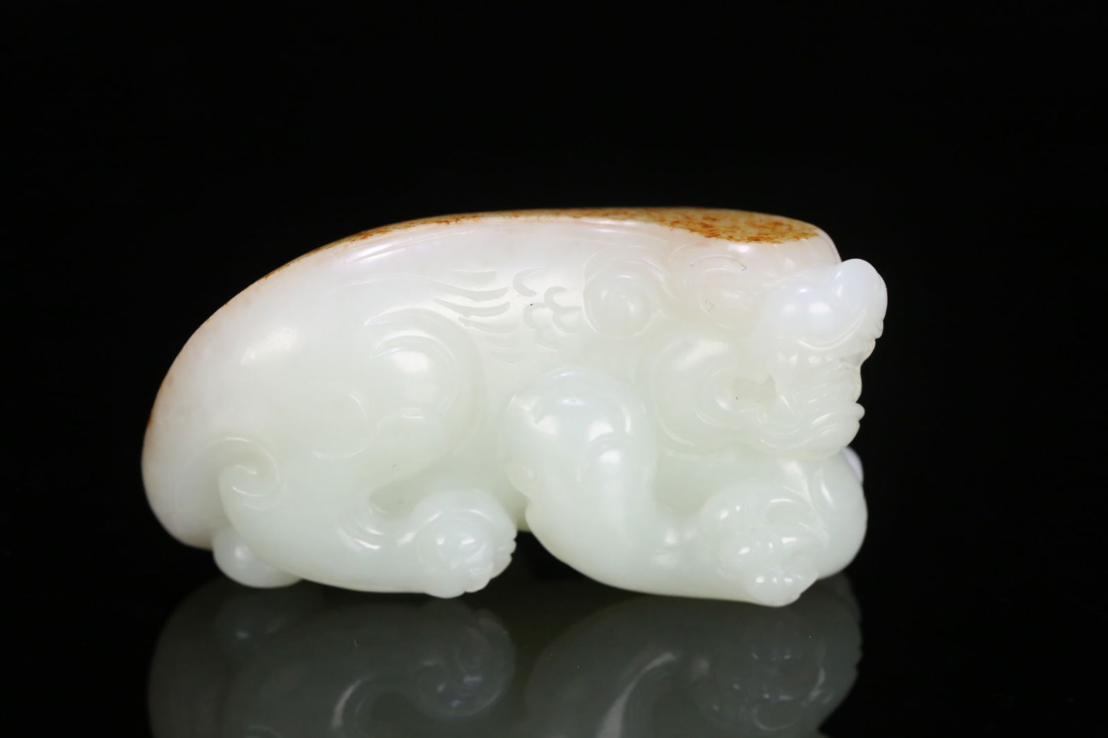 An Exquisite White Jade Auspicious Beast Hand Piece (1 of 10)
