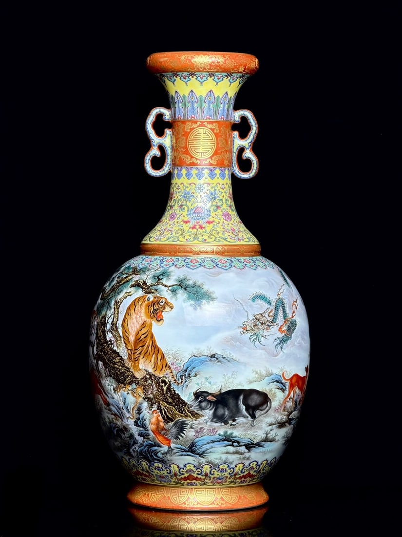 An Exquisite Iron-Red Painted Gold Bats and Peach Pattern Lotus Pattern Auspicious Beast Pattern: An Exquisite Iron-Red Painted Gold Bats and Peach Pattern Lotus Pattern Auspicious Beast Pattern Double-Ears Vase Qing Dynasty, China Qianlong Four-character Mark Size:54.8cmx27cm (The Dimensions Of A