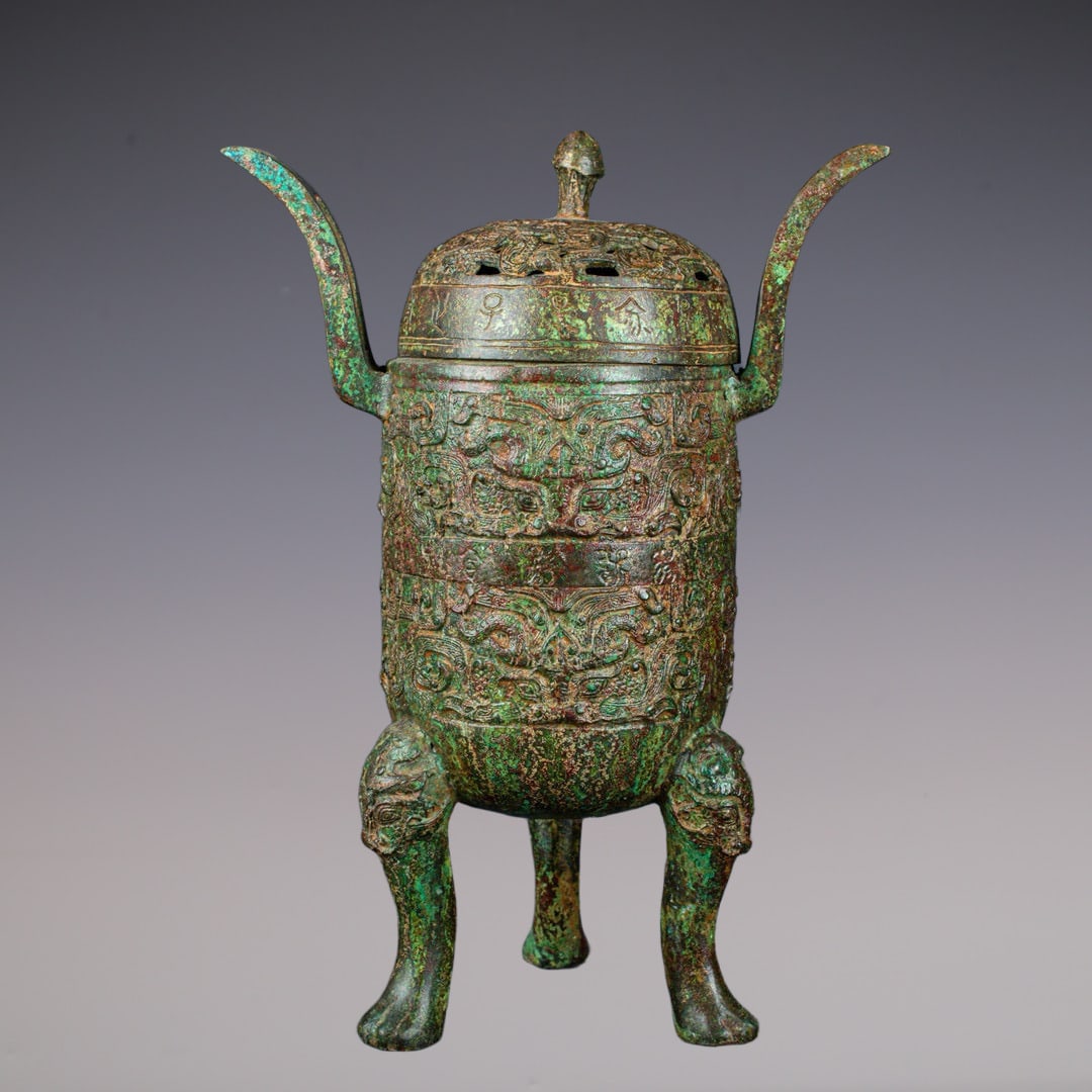 An Exquisite Bronze Beast-Face Pattern With Inscription Double-Ears and Tripod Censer (1 of 9)
