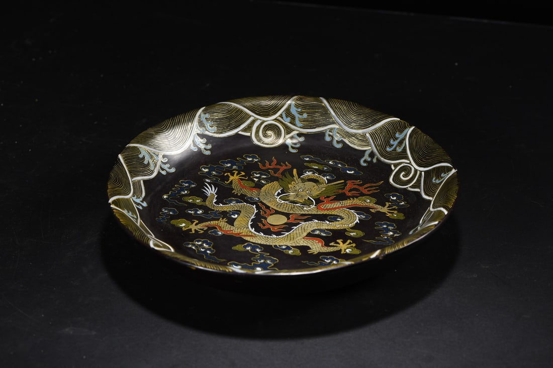 An Exquisite Black Lacquer Painted Gold Dragon Pattern Seawater Pattern Plate: An Exquisite Black Lacquer Painted Gold Dragon Pattern Seawater Pattern Plate Qing Dynasty, China Qianlong Four-character Mark Size:23.5cmx4.5cm Weight:300g (The Dimensions Of All Batches Are Manually
