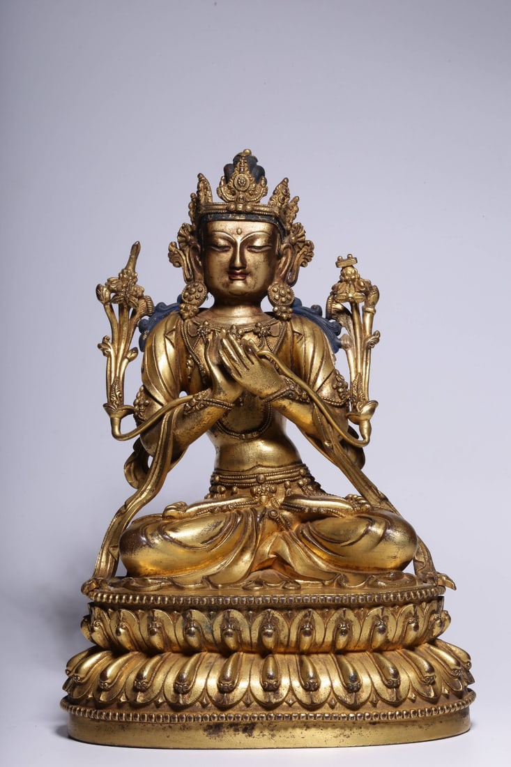 An Exquisite Gilt Bronze Statue of Manjusri: An Exquisite Gilt Bronze Statue of Manjusri Qing Dynasty, China Size:23cmx16cmx10.5cm Weight:2004g (The Dimensions Of All Batches Are Manually Measured.If You Need More Detailed Information, Please Co