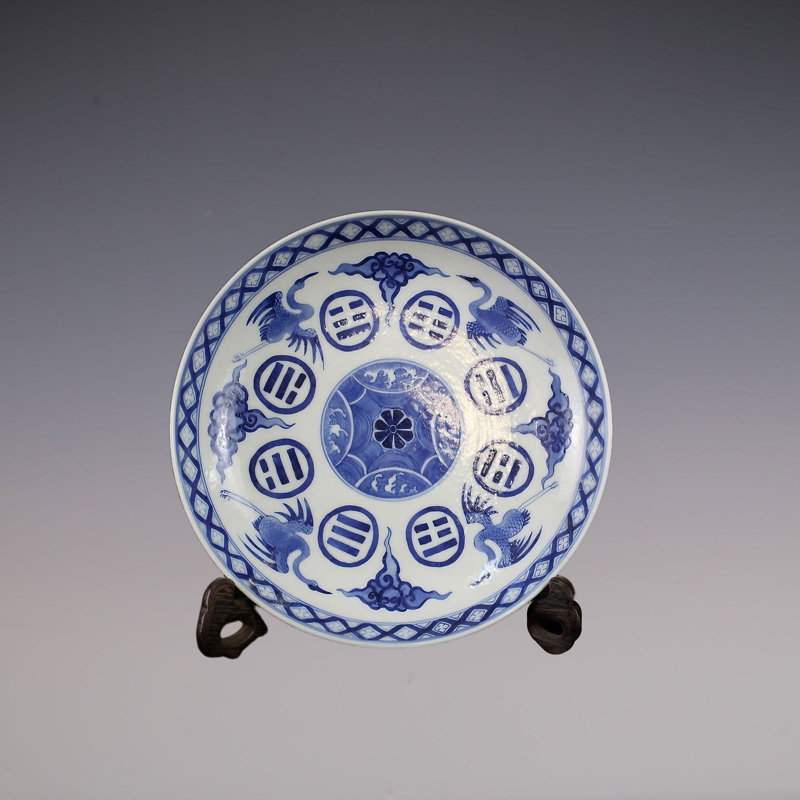 An Exquisite Blue and White Crane Pattern Plate: An Exquisite Blue and White Crane Pattern Plate Qing Dynasty, China Guangxu Six-character Mark Size:19.5cmx11cm (The Dimensions Of All Batches Are Manually Measured.If You Need More Detailed Informati