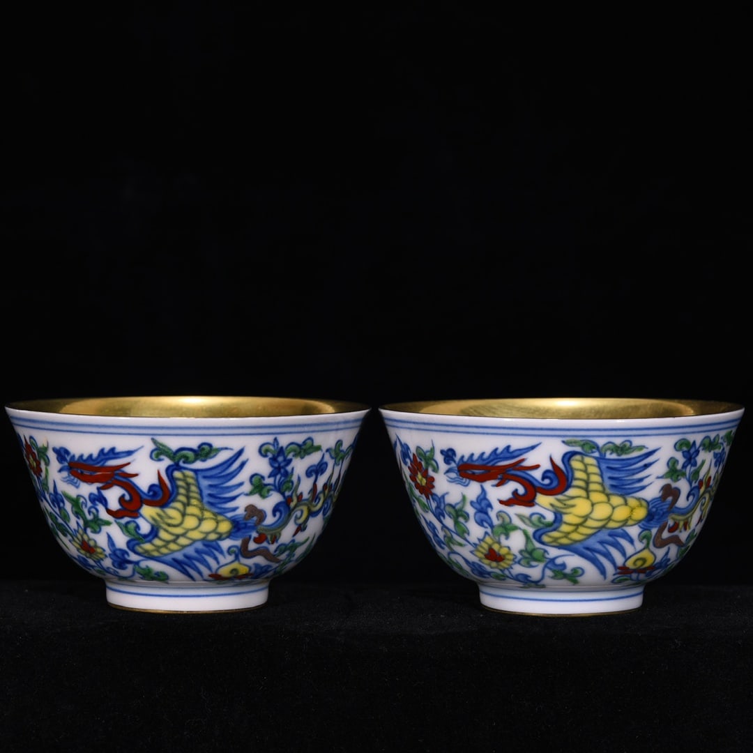 An Exquisite Doucai Painted Gold Phoenix Pattern Lotus Pattern Cup: An Exquisite Doucai Painted Gold Phoenix Pattern Lotus Pattern Cup Ming Dynasty, China Chenghua Six-character Mark Size:5.5cmx8.5cm (The Dimensions Of All Batches Are Manually Measured.If You Need Mor