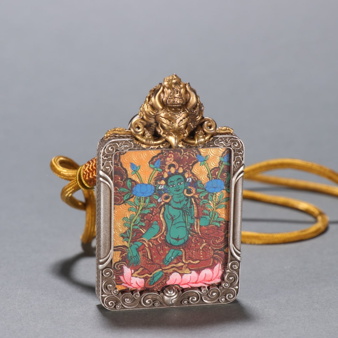 A fine copper-gilt silver gilt green Tara thangka (1 of 9)