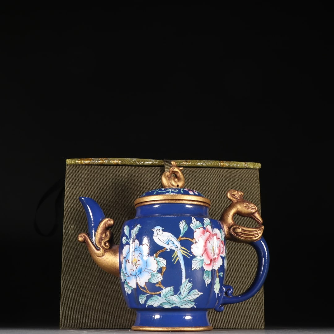 A purple sand enamel flower and bird pattern teapot from the Qing Dynasty: Qing Dynasty purple sand enamel flower and bird pattern teapot Size:H:15cmW:15.6cm (The Dimensions Of All Batches Are Manually Measured.If You Need More Detailed Information, Please Contact Our Custom