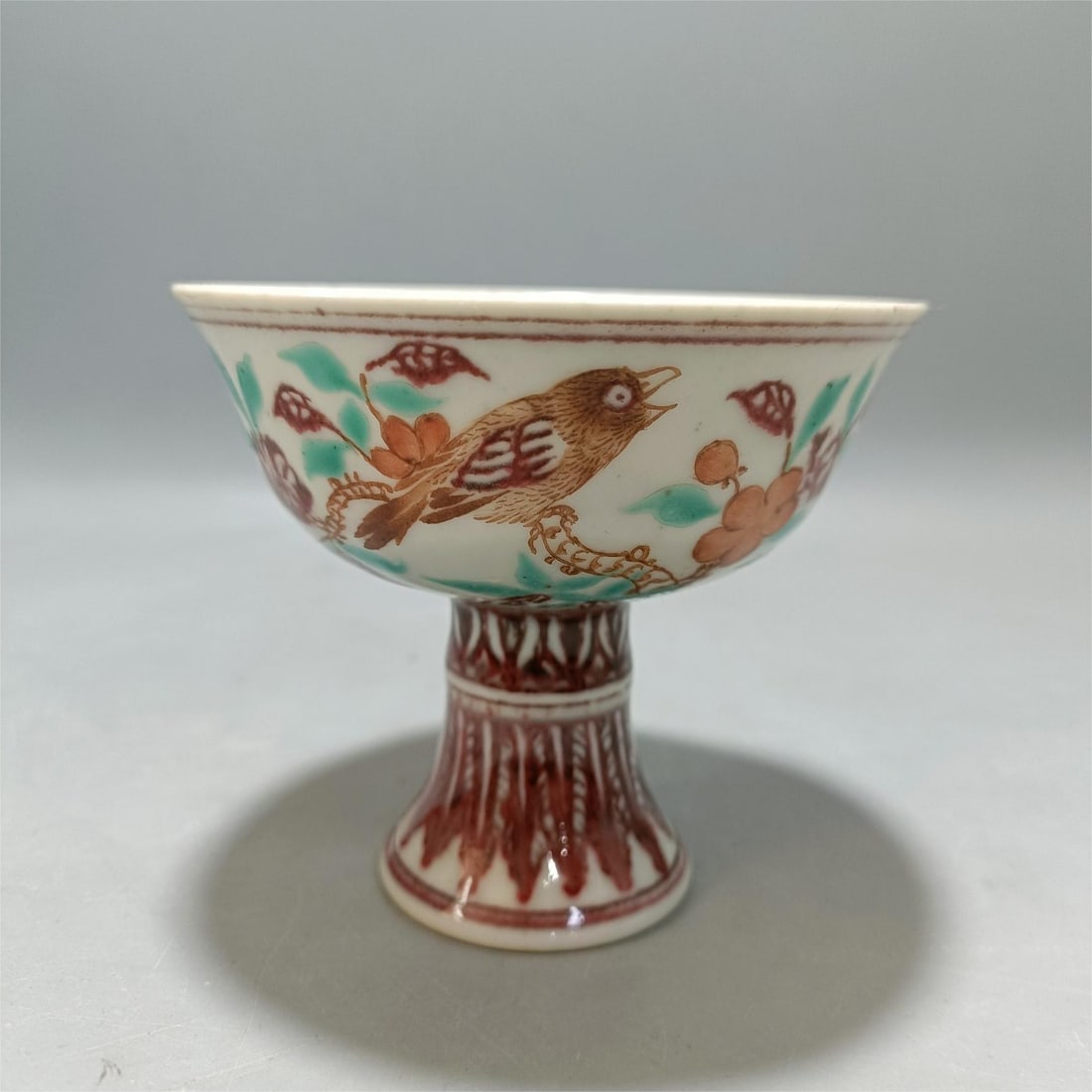 A colorful flower and bird goblet made in the Xuande era of the Ming Dynasty (1 of 9)