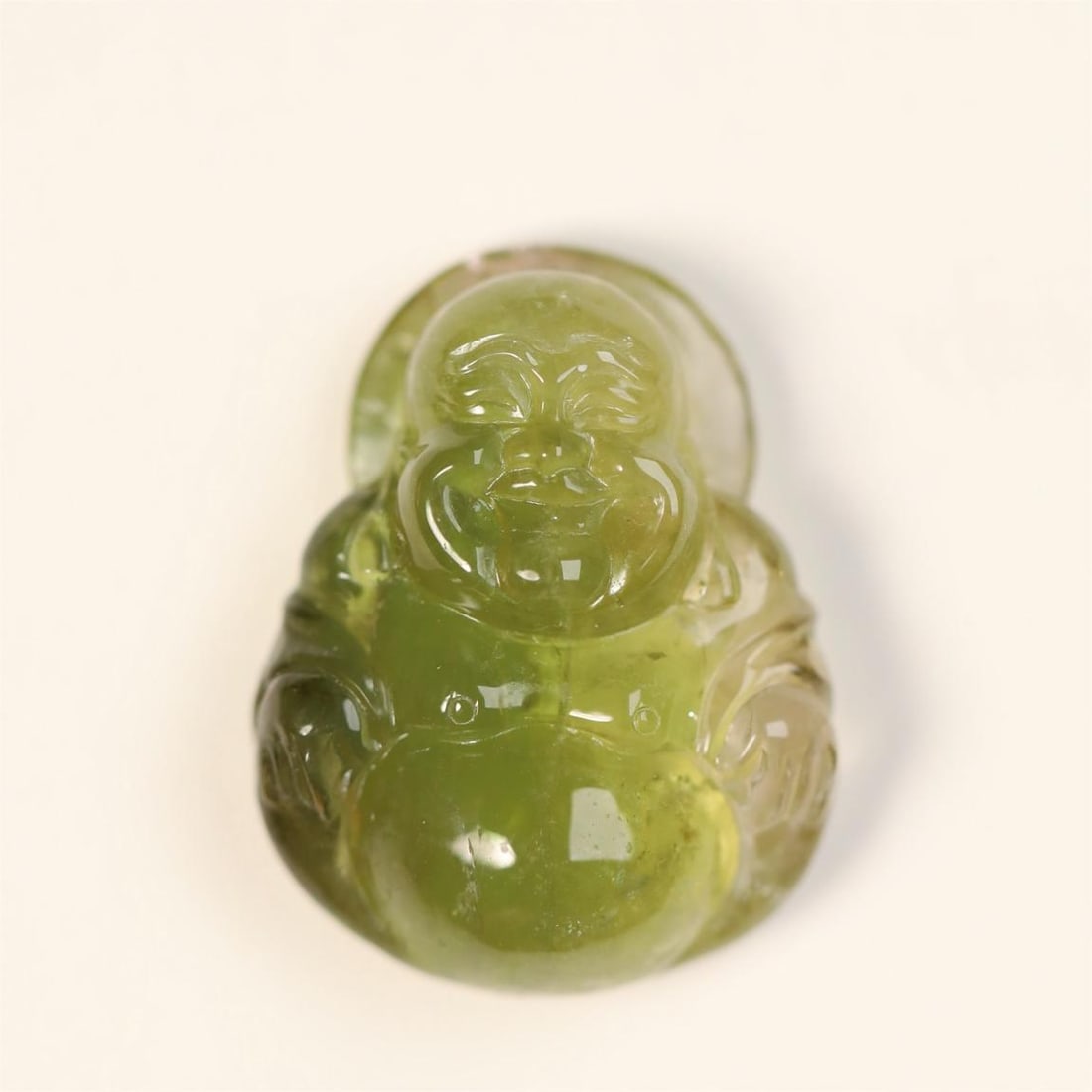 A beautiful glue-free and non-optimized green tourmaline Buddha (1 of 6)