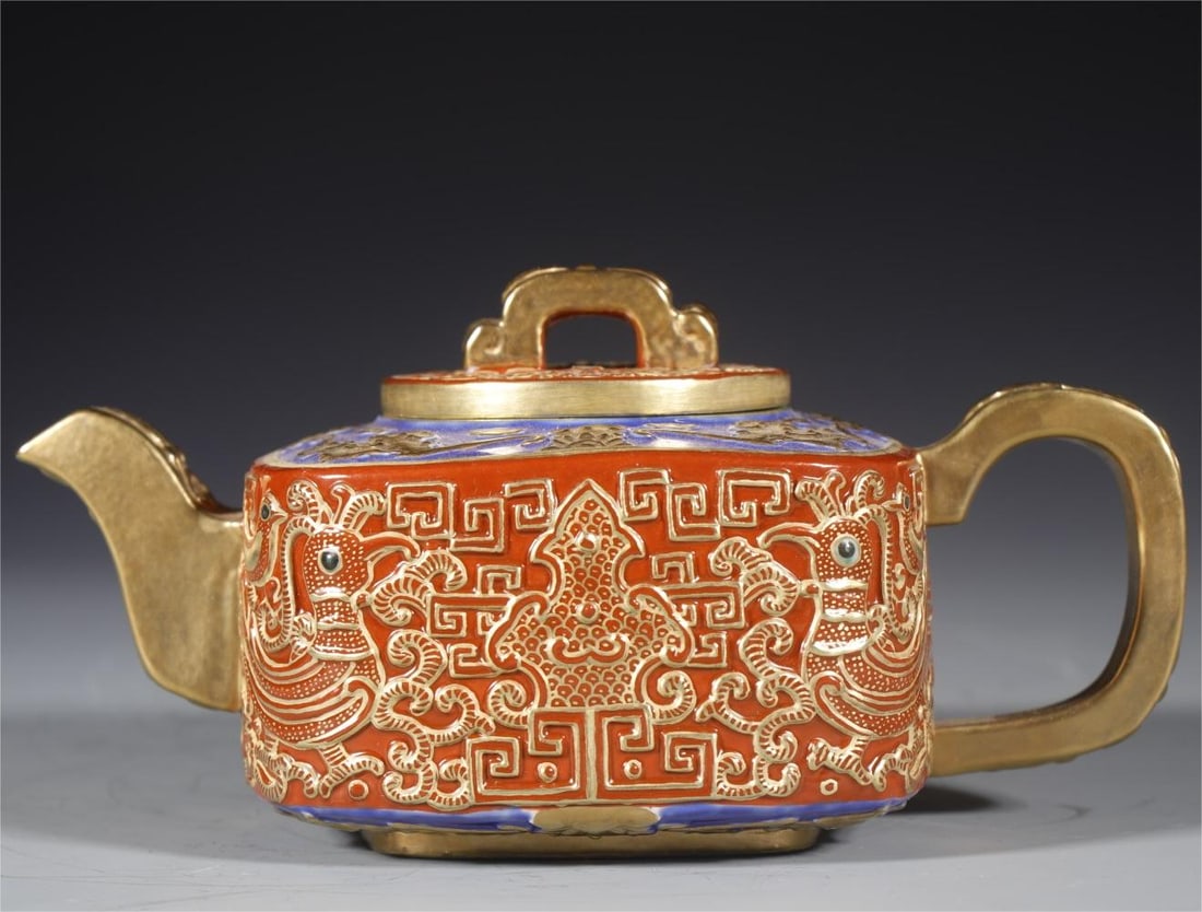 A carved Fulu Shouxi teapot made in the Qianlong period of the Qing Dynasty (1 of 9)