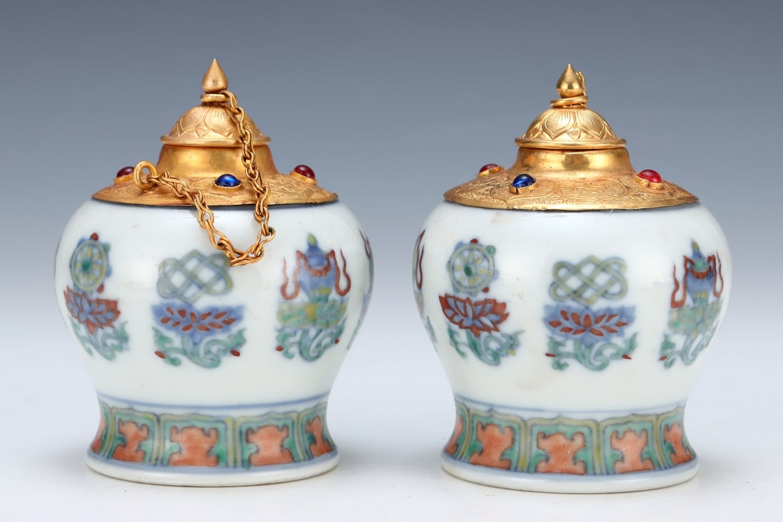 A Ming Dynasty Chenghua year system Doucai wrapped in gold carved eight treasure pattern heavenly (1 of 9)