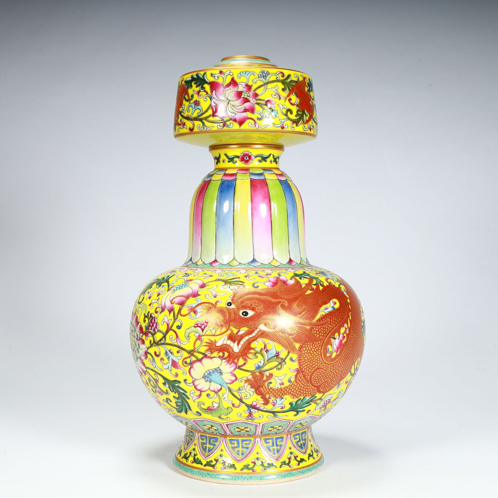 A Qing Dynasty Qianlong yellow pastel entwined floral pattern Benba bottle: Qing Dynasty Qianlong yellow pastel entwined floral pattern Benba bottle Size:H:27cmL:14cmW:14cmW:1.3kg (The Dimensions Of All Batches Are Manually Measured.If You Need More