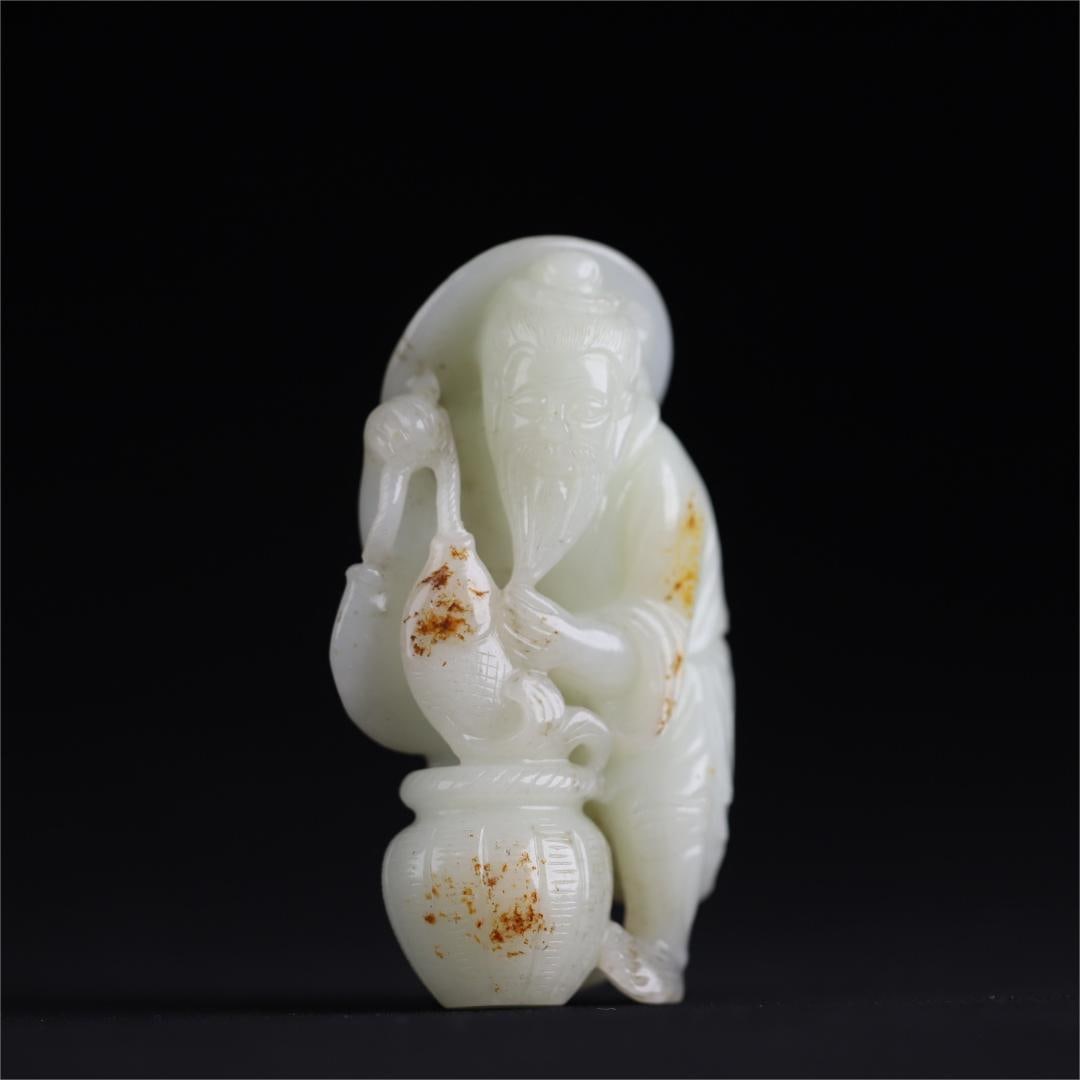 A Qing Dynasty Hetian jade fisherman deli ornament: The Hetian jade fisherman of the Qing Dynasty is a profit ornament Size:9.2x5.7x3.0cmW:200g (The Dimensions Of All Batches Are Manually Measured.If You Need More Detailed Information, Please Contact O