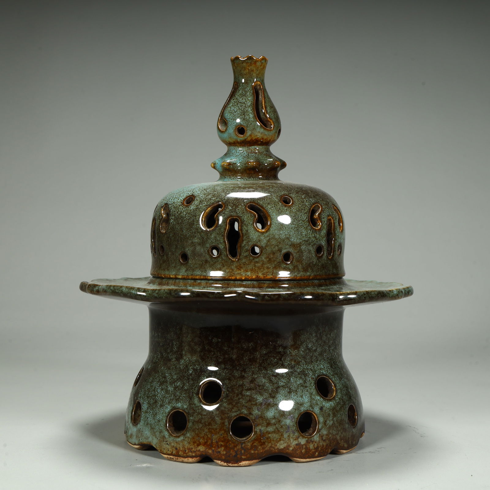 A kiln changed glazed hollow aroma burner from the Qing Dynasty (1 of 9)