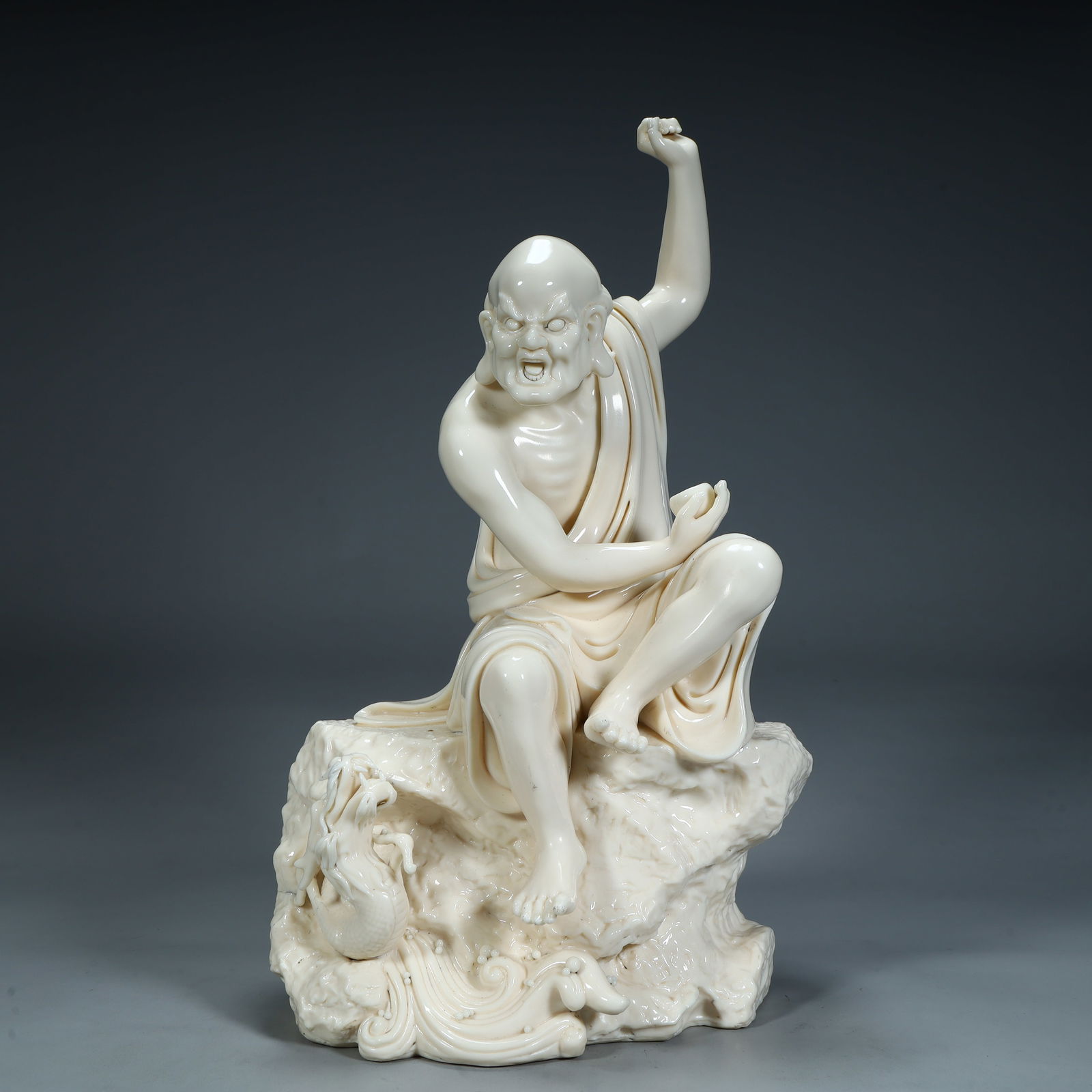 A Qing Dynasty Dehua white porcelain dragon descending Arhat ornament: Qing Dynasty Dehua white porcelain dragon descending Arhat ornament Size:H:37cmL:21cmW:16cmW:4.1kg (The Dimensions Of All Batches Are Manually Measured.If You Need More Detailed Information, Please Co