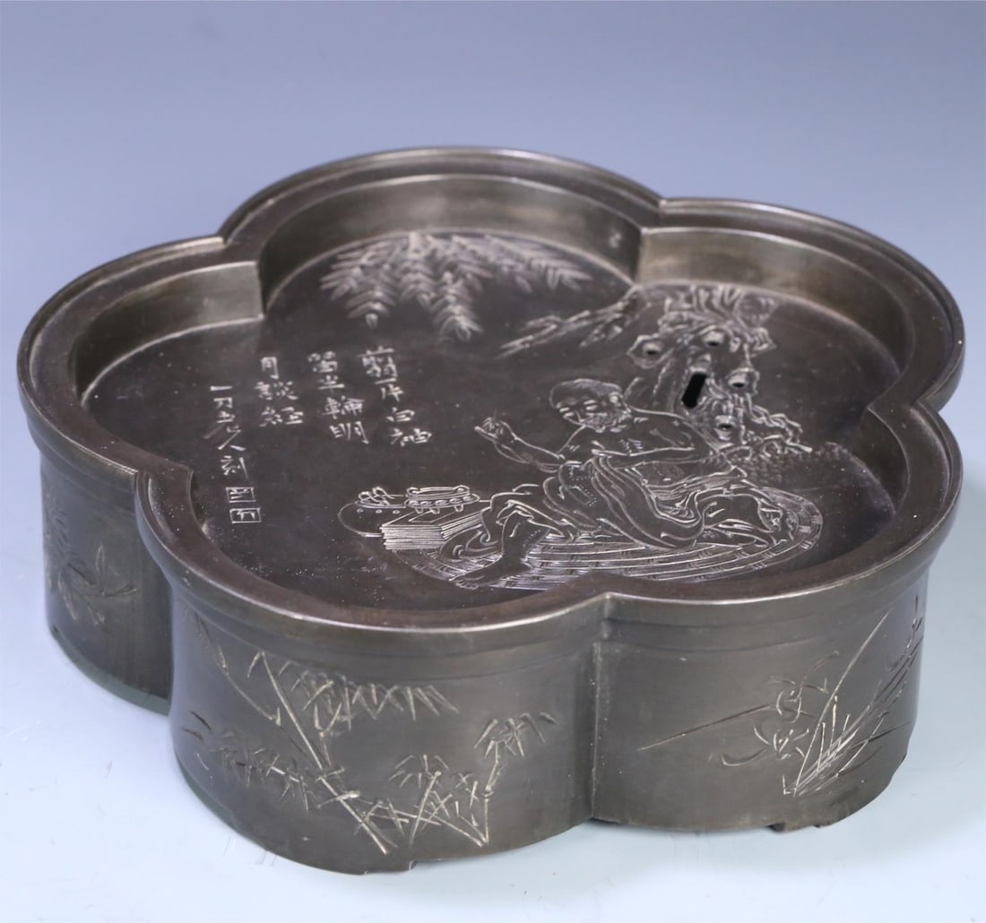 An old pewter carved by an old man with a knife, plum orchid, bamboo chrysanthemum, figure,: An old pewter carved by an old man with a knife, plum orchid, bamboo chrysanthemum, and a sunflower-shaped tea contract Size:20x6cmW:1893.4g (The Dimensions Of All Batches Are Manually Measured.If You