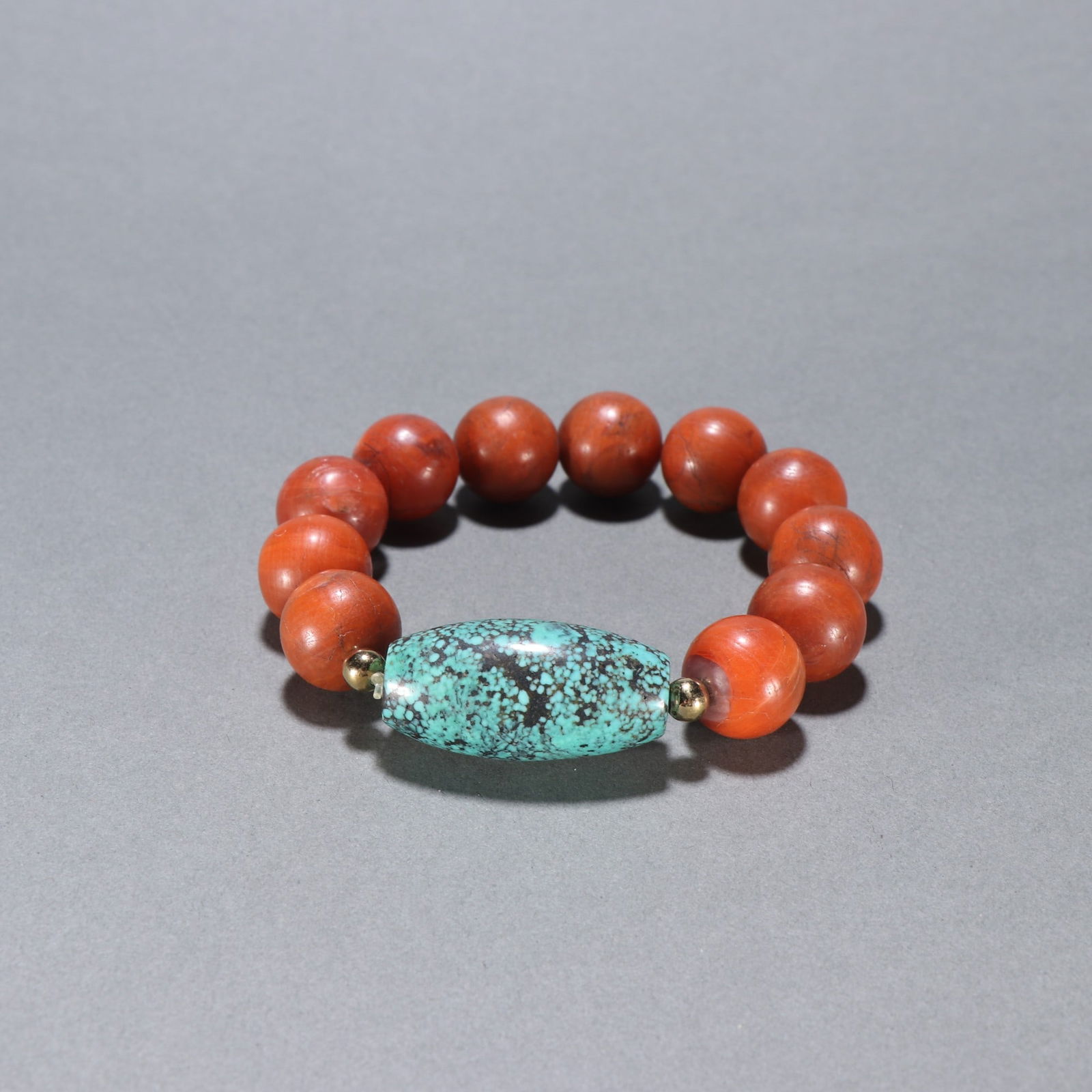 A Qing Dynasty Nanhong with turquoise bracelet (1 of 9)