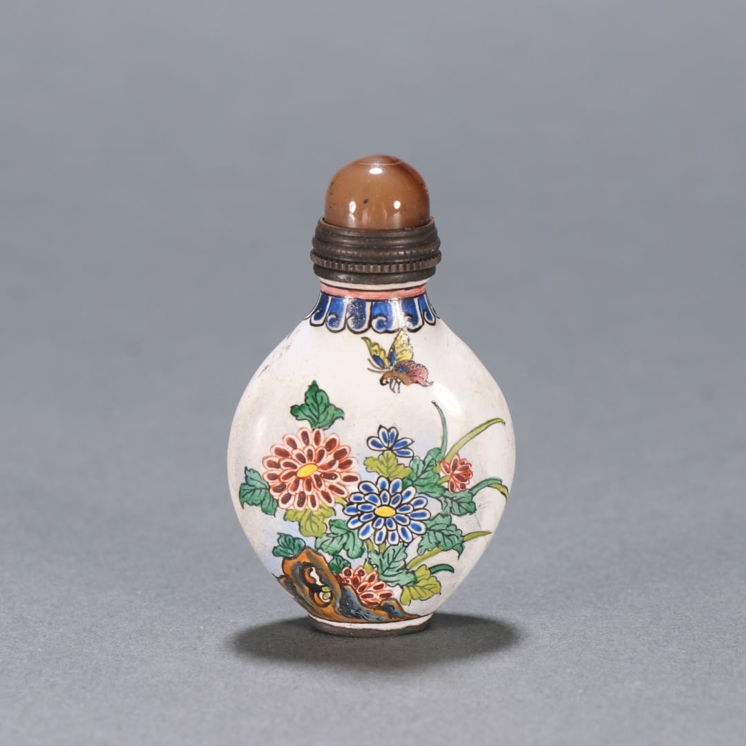 A Qing Dynasty copper tire painting enamel flower butterfly pattern snuff bottle (1 of 9)