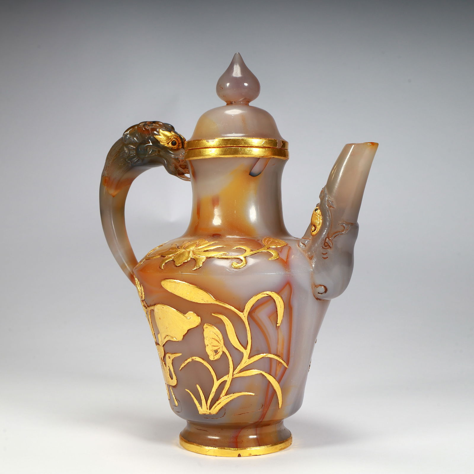 A piece of exquisite agate gold-clad dragon handle all the way to the pot: Exquisite agate gold-filled pot with a dragon handle all the way Size:H:23cmL:19cmW:11cmW:809g (The Dimensions Of All Batches Are Manually Measured.If You Need More Detailed Information, Please Contac