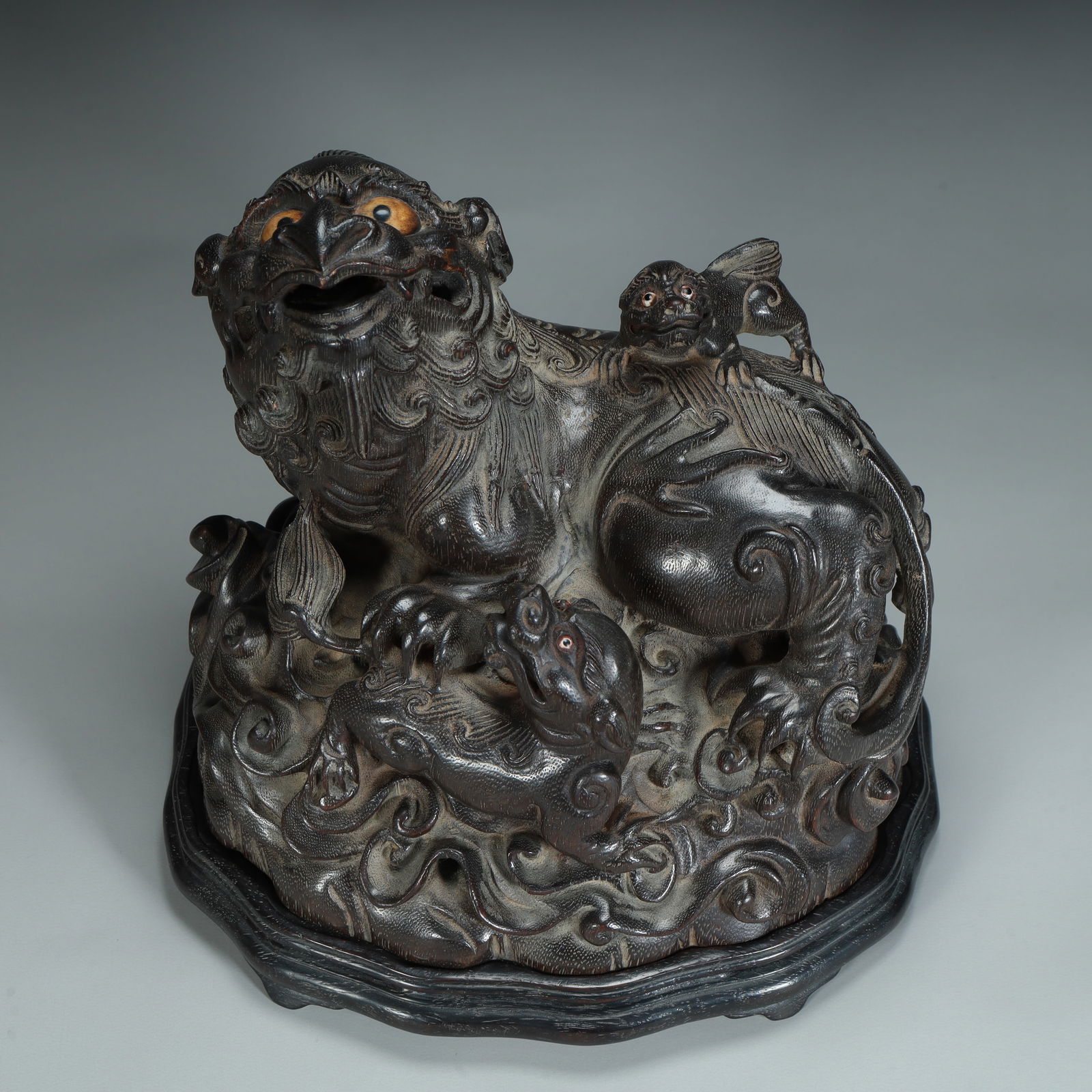 A Qing Dynasty agarwood carving Taishi and Young Lion ornaments (1 of 10)