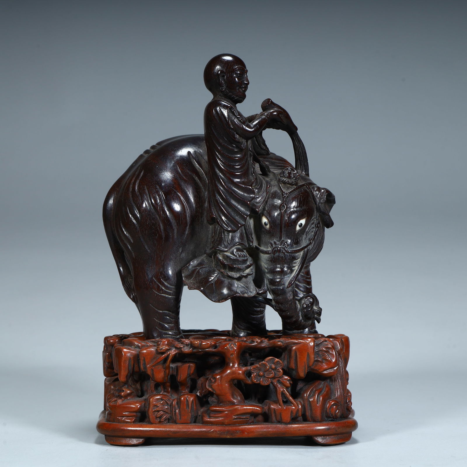 A Qing Dynasty rosewood carving Arhat elephant ornament: Qing Dynasty rosewood carving Arhat elephant ornament Size:H:16.5cmL:11cmW:8.5cmW:525g (The Dimensions Of All Batches Are Manually Measured.If You Need More Detailed Information, Please Contact Our Cu