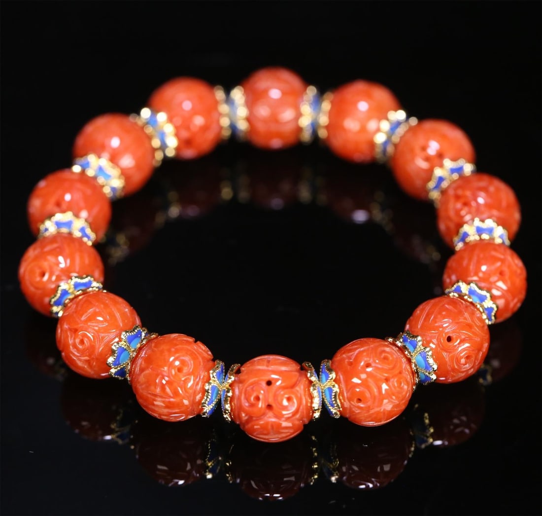 A red jade hollow entangled longevity pattern bracelet of the Qing Dynasty (1 of 6)