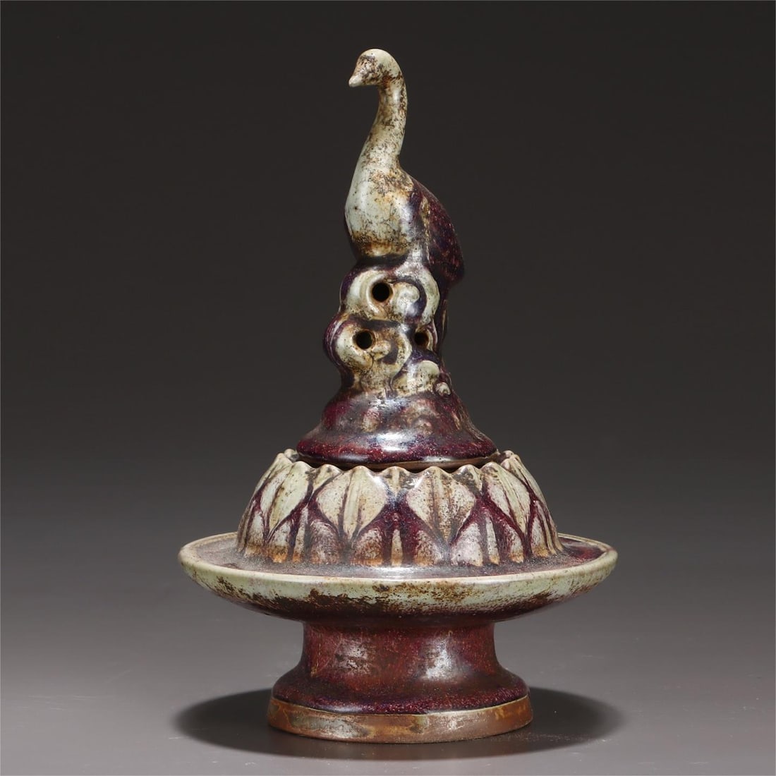 A purple-red glazed cloud crane smoker of the Song Dynasty Jun kiln (1 of 9)