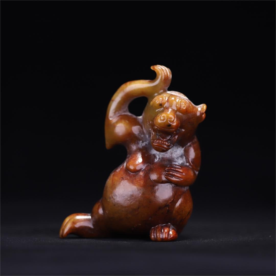 An ancient jade bear ornament from the Han Dynasty (1 of 9)