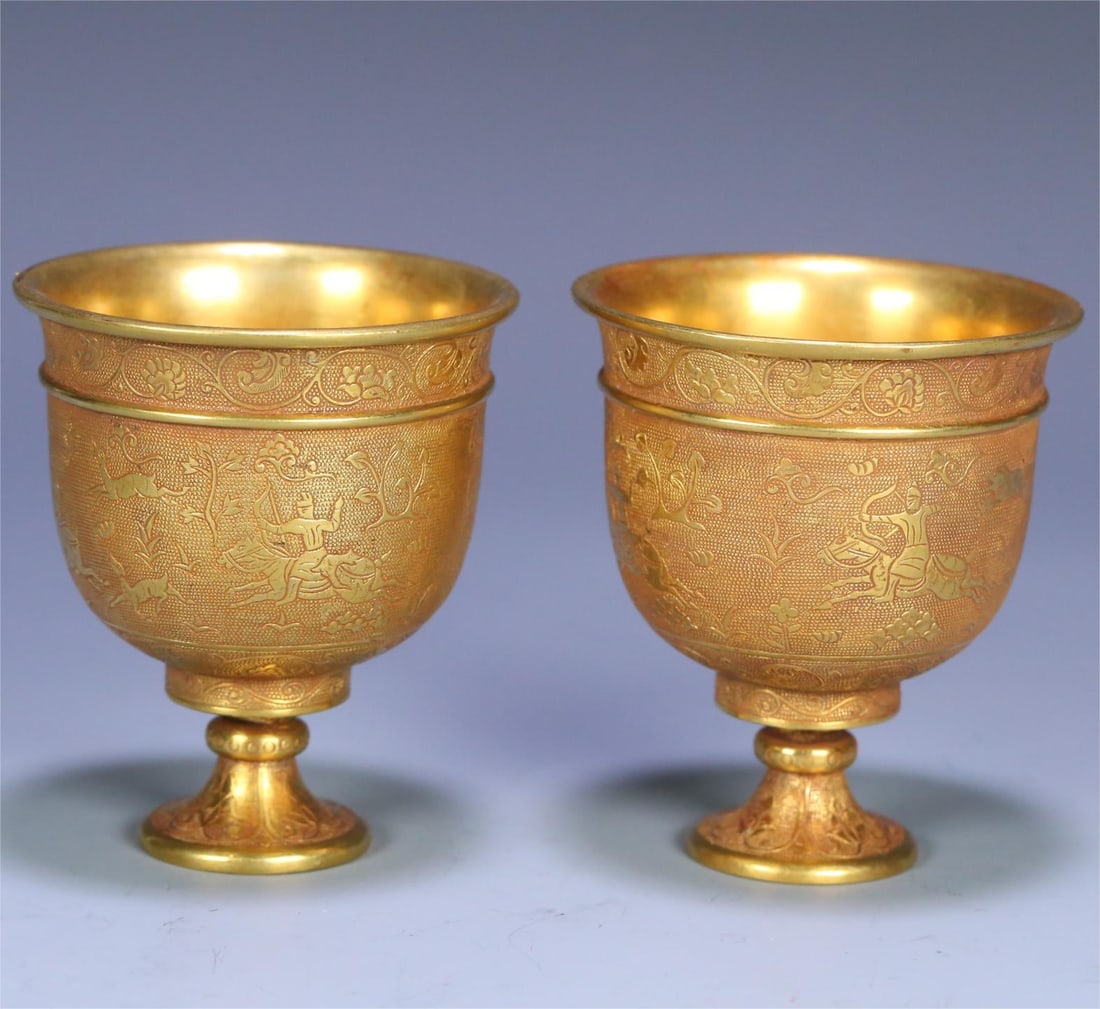 A pair of copper-gilt Hu hunting goblets from the Tang Dynasty (1 of 9)