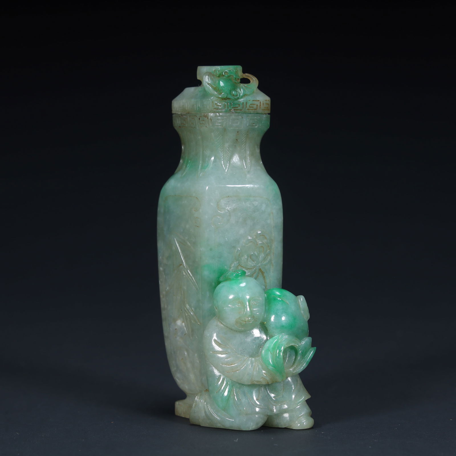 A Qing Dynasty jade boy holding a bottle: Qing Dynasty jade boy holding a bottle ornament SIZE: H:7.9cm L:3.5cm W:2.5cm W:72.5g (The Dimensions Of All Batches Are Manually Measured.If You Need More Detailed Information, Please Contact