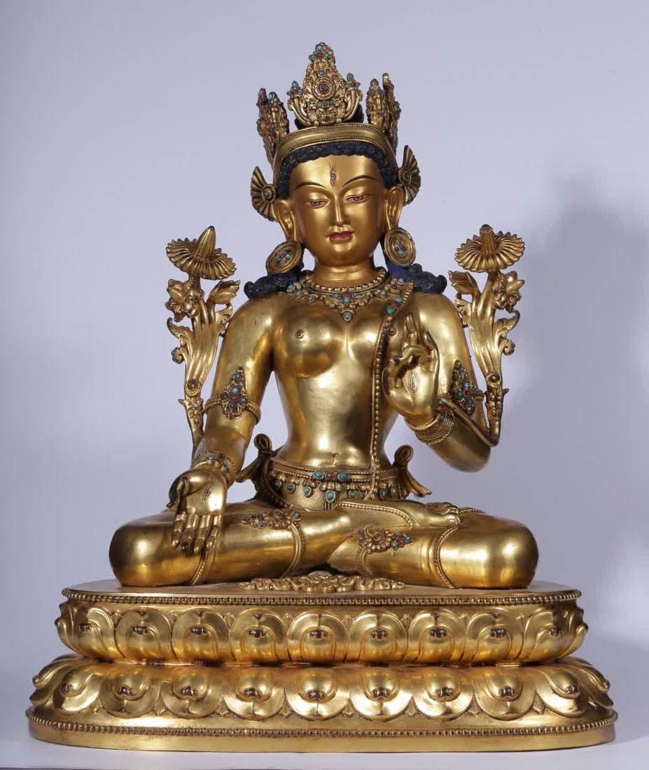 A seated statue of Tara in the Qing Dynasty with copper gilt inlaid treasures (1 of 13)