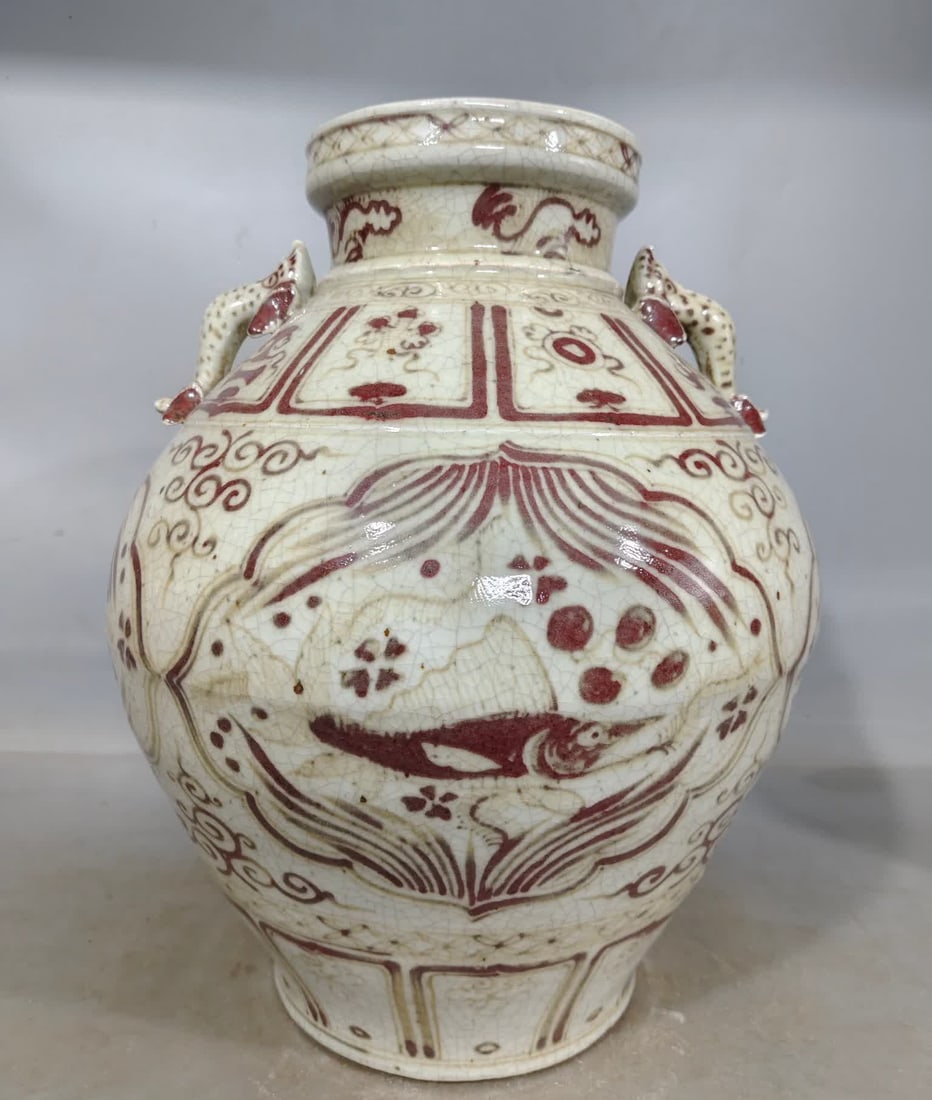 A red fish and algae pattern animal ear jar in the glaze of the Cizhou kiln in the Yuan Dynasty (1 of 7)